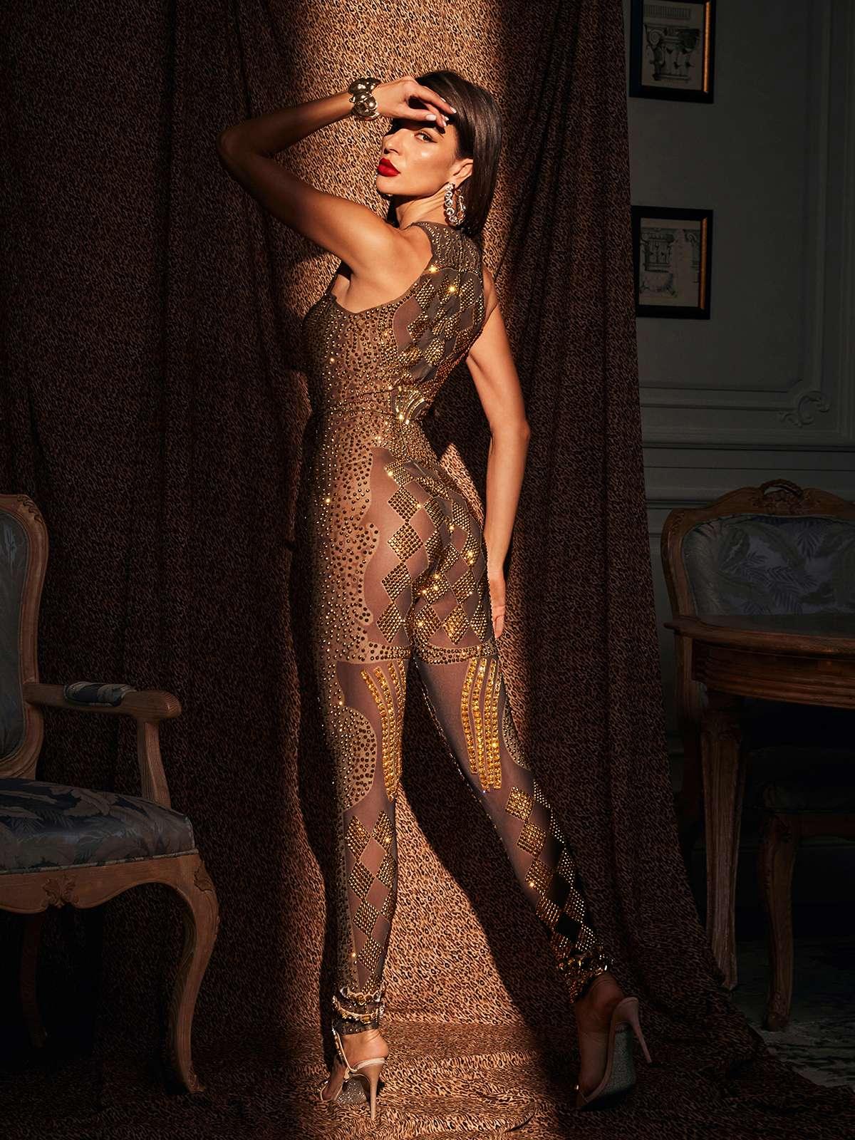 Caterina Printed Rhinestone Jumpsuit in black with gold accents, perfect for stylish evening wear.