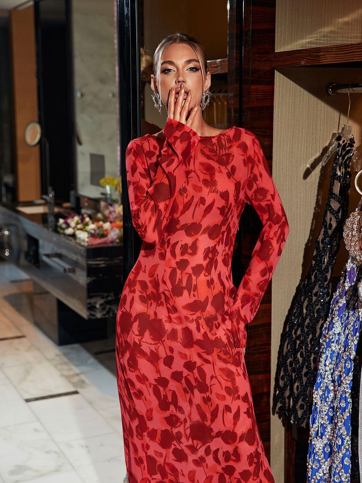 Back view of the Cecily Long Sleeve Rose Printed Maxi Dress, showcasing the flowy design and sophisticated style perfect for any occasion.