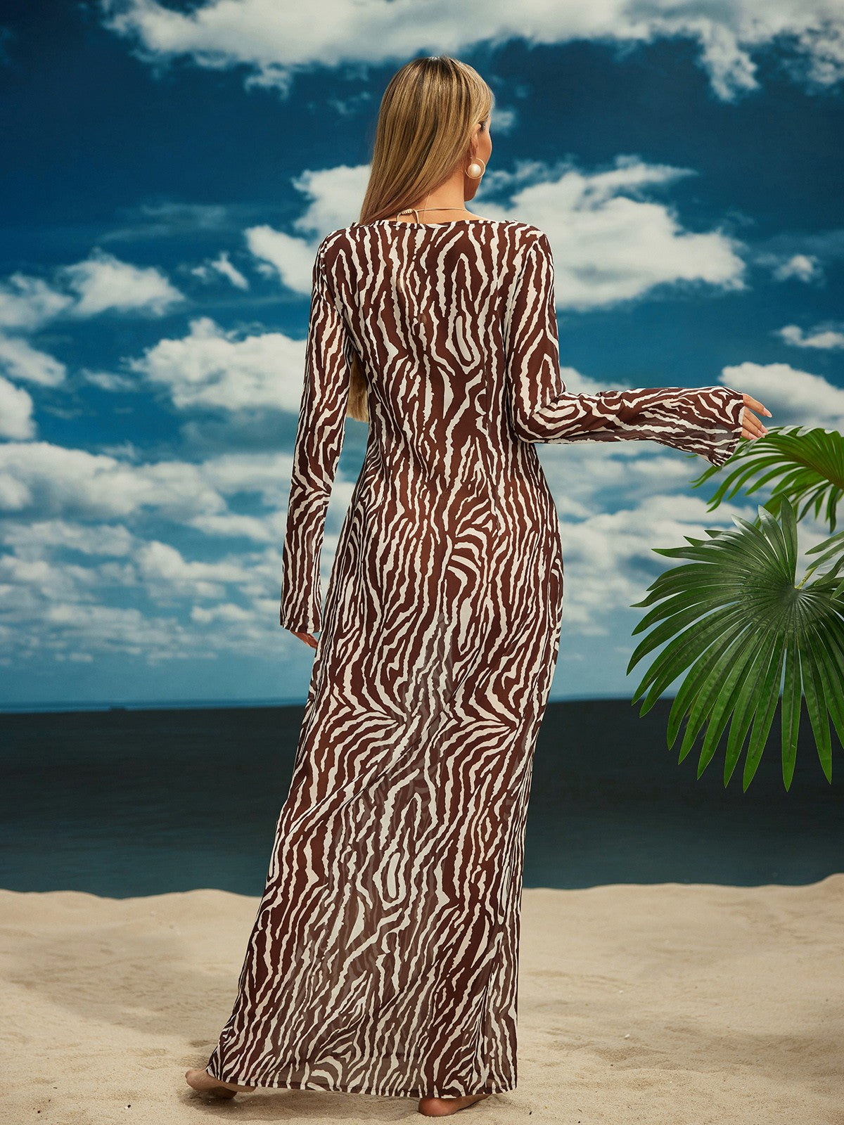 Cecily Maxi Dress in natural light, highlighting the rich brown tones and animal print.