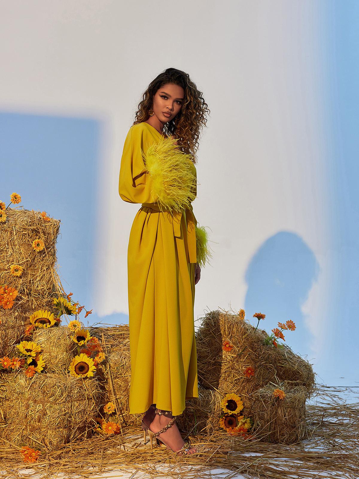 Ceridwen V Neck Feather Trimmed Split Maxi Dress in yellow, showcasing elegant design and graceful silhouette.