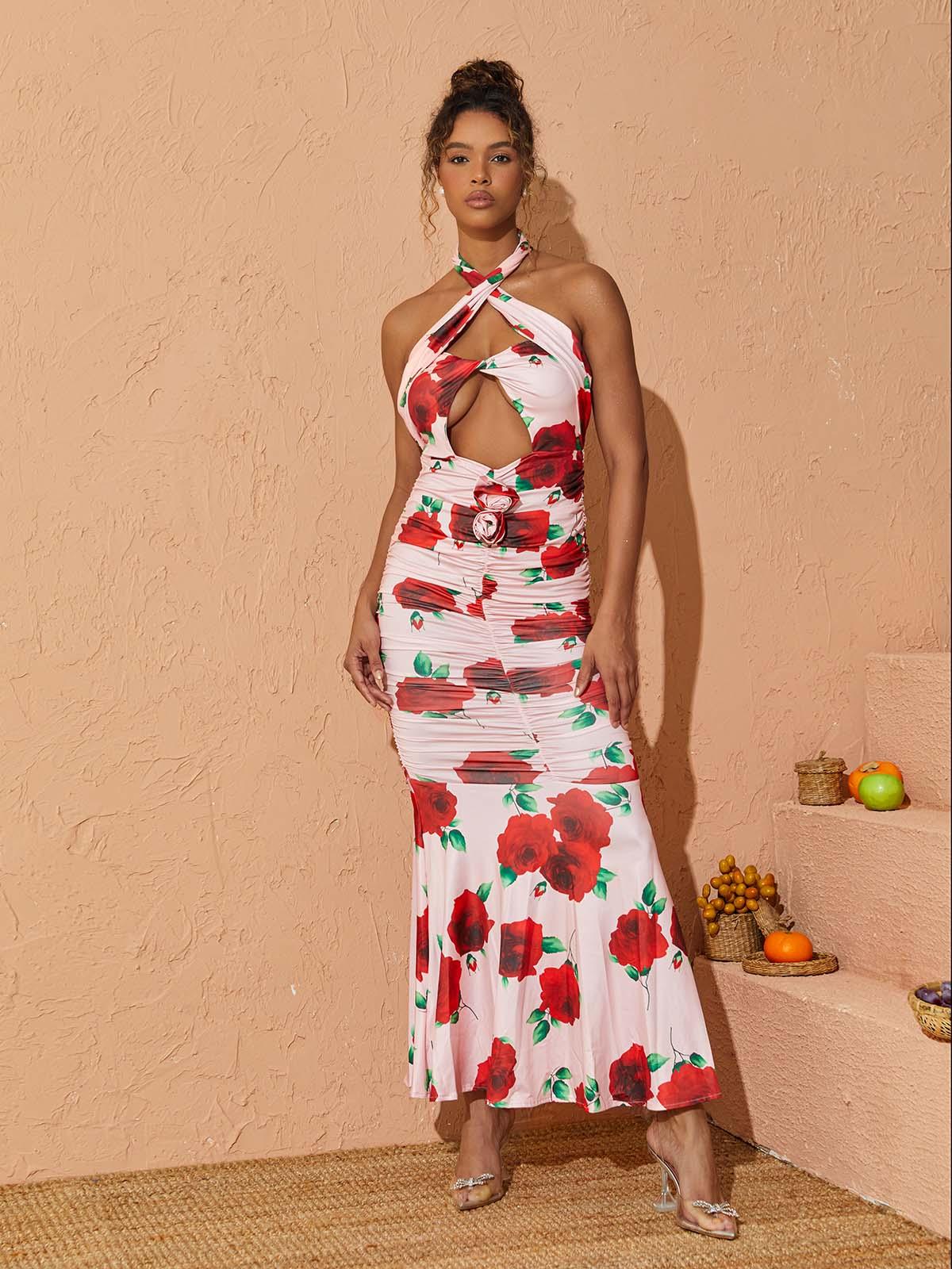 Charlotte Halterneck Rose Printed Maxi Dress featuring a floral design and elegant backless detail.