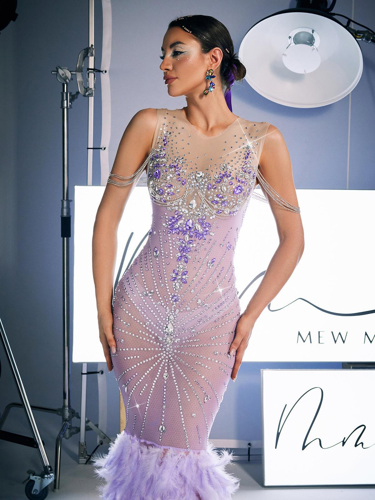 Close-up view of the rhinestone detailing on the Chaviv Maxi Dress, highlighting its luxurious embellishments and elegant design.