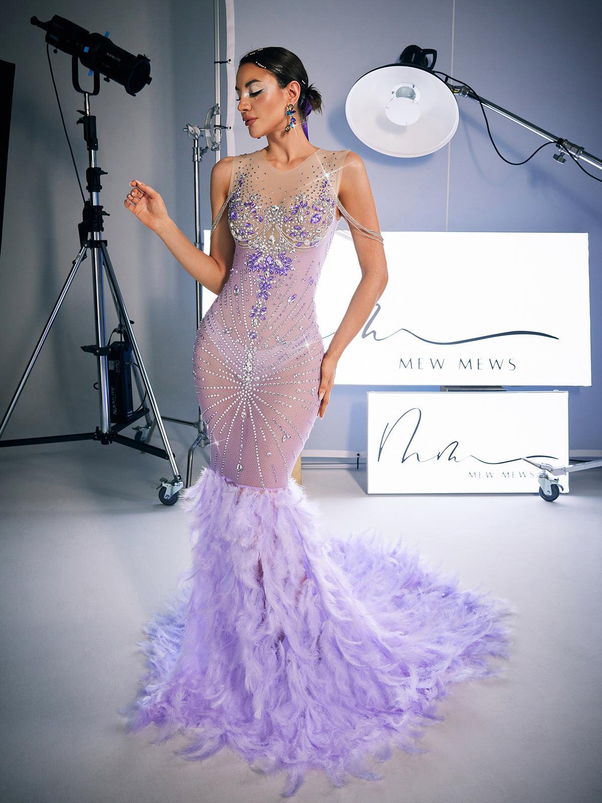Chaviv Rhinestone Feather Maxi Dress in purple, featuring elegant feather accents and shimmering rhinestones for a glamorous look.