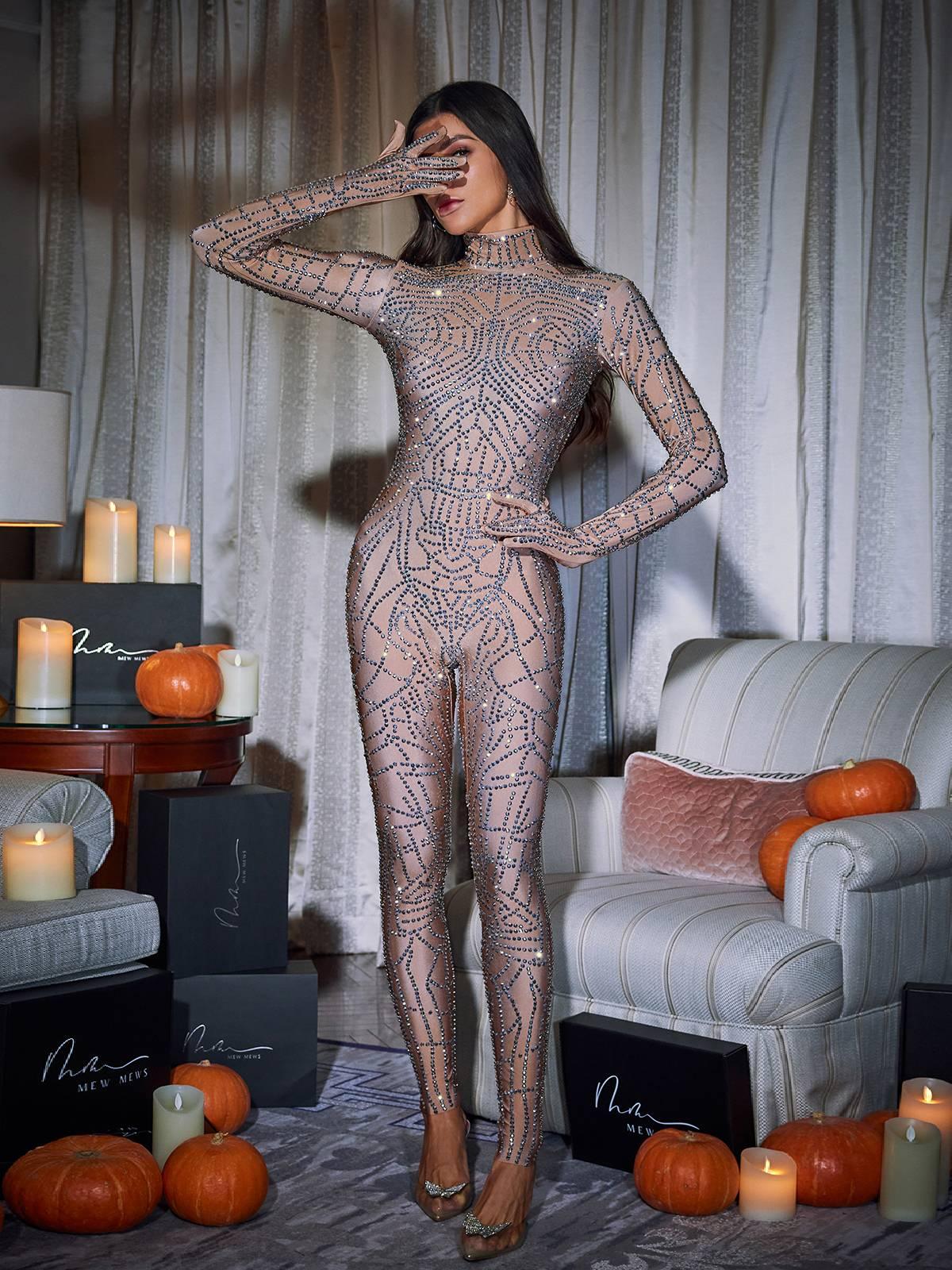 Chimera Cobweb Rhinestone Jumpsuit in nude featuring stunning rhinestone details and a chic cobweb design.
