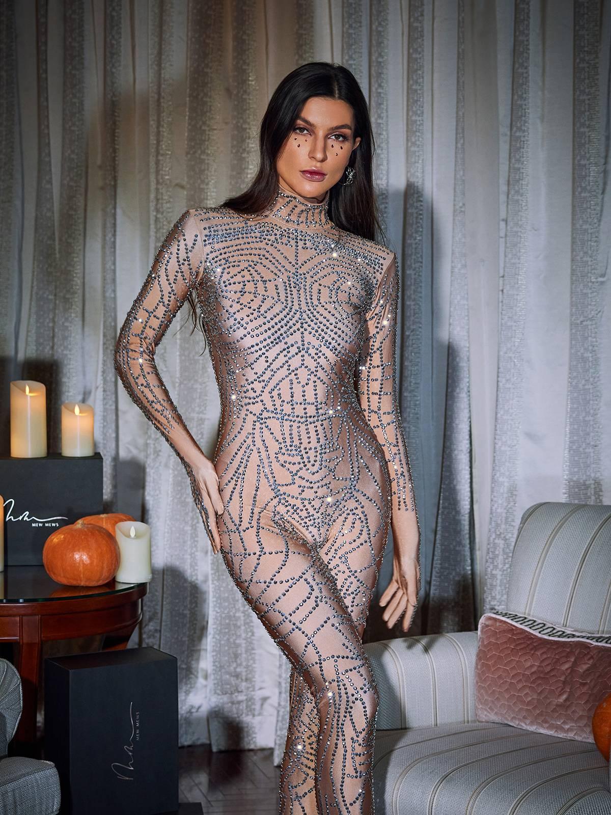 Chimera Cobweb Rhinestone Jumpsuit in nude featuring stunning rhinestone details and a chic cobweb design.