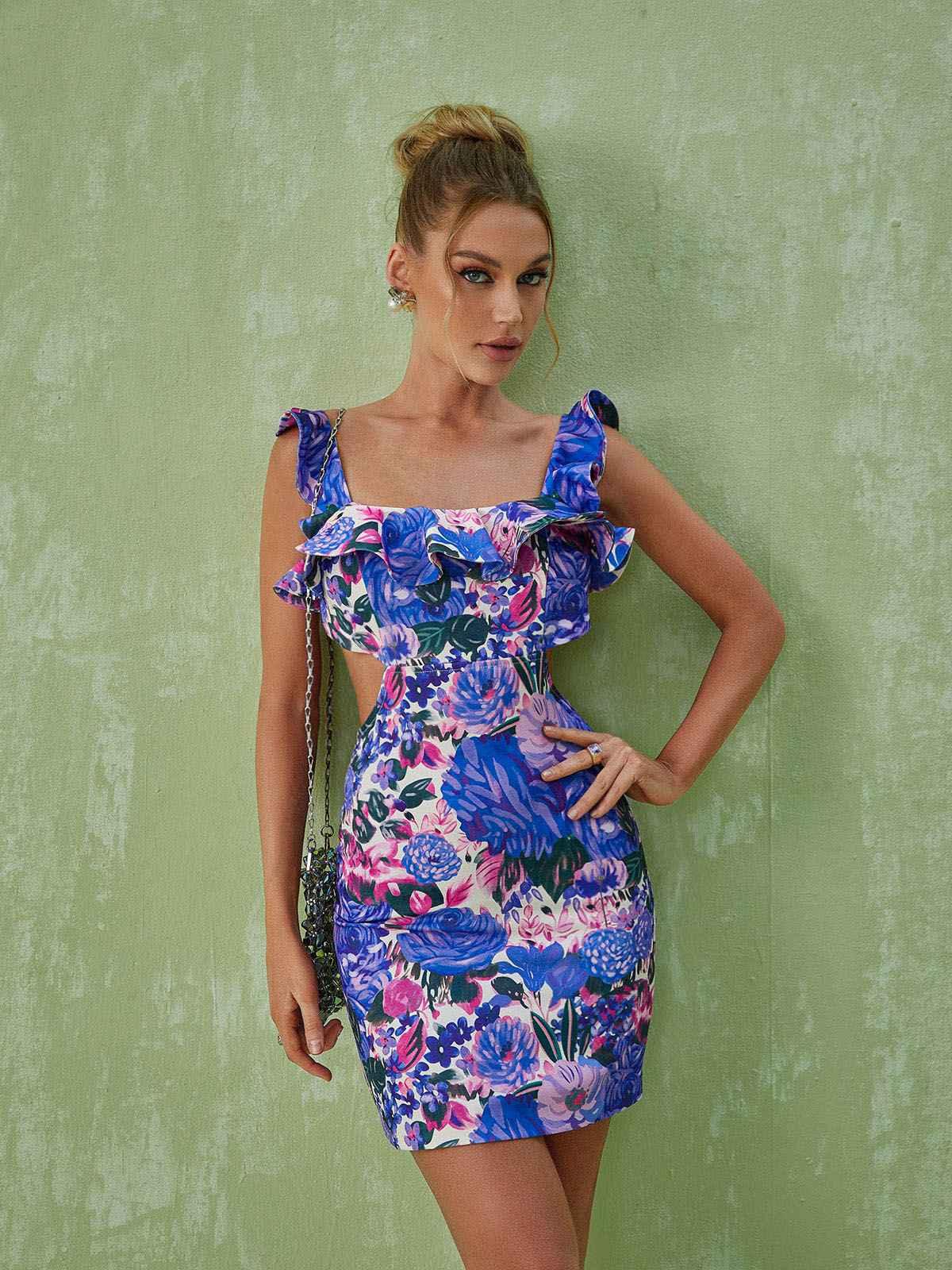 Cinnamon Ruffle Printed Mini Dress featuring a flirty flower print and cutout waist, perfect for summer outings.
