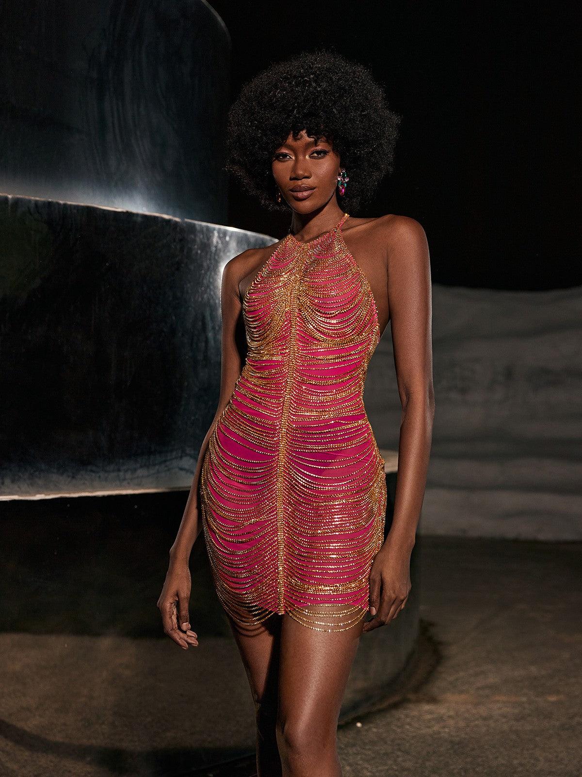Cinzia Halterneck Diamond Chain Mesh Mini Dress in vibrant hot pink, showcasing a stylish backless design and trendy embellishments.