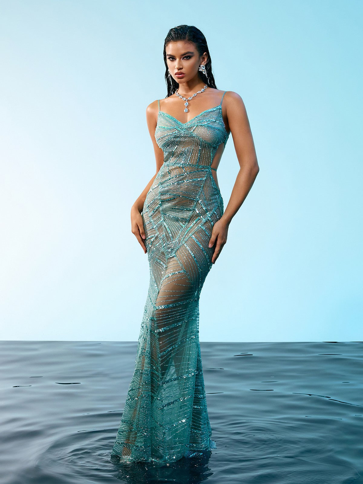 Cynthia Spaghetti Sequin Maxi Dress in blue featuring elegant sequin details and spaghetti straps for a glamorous evening look.