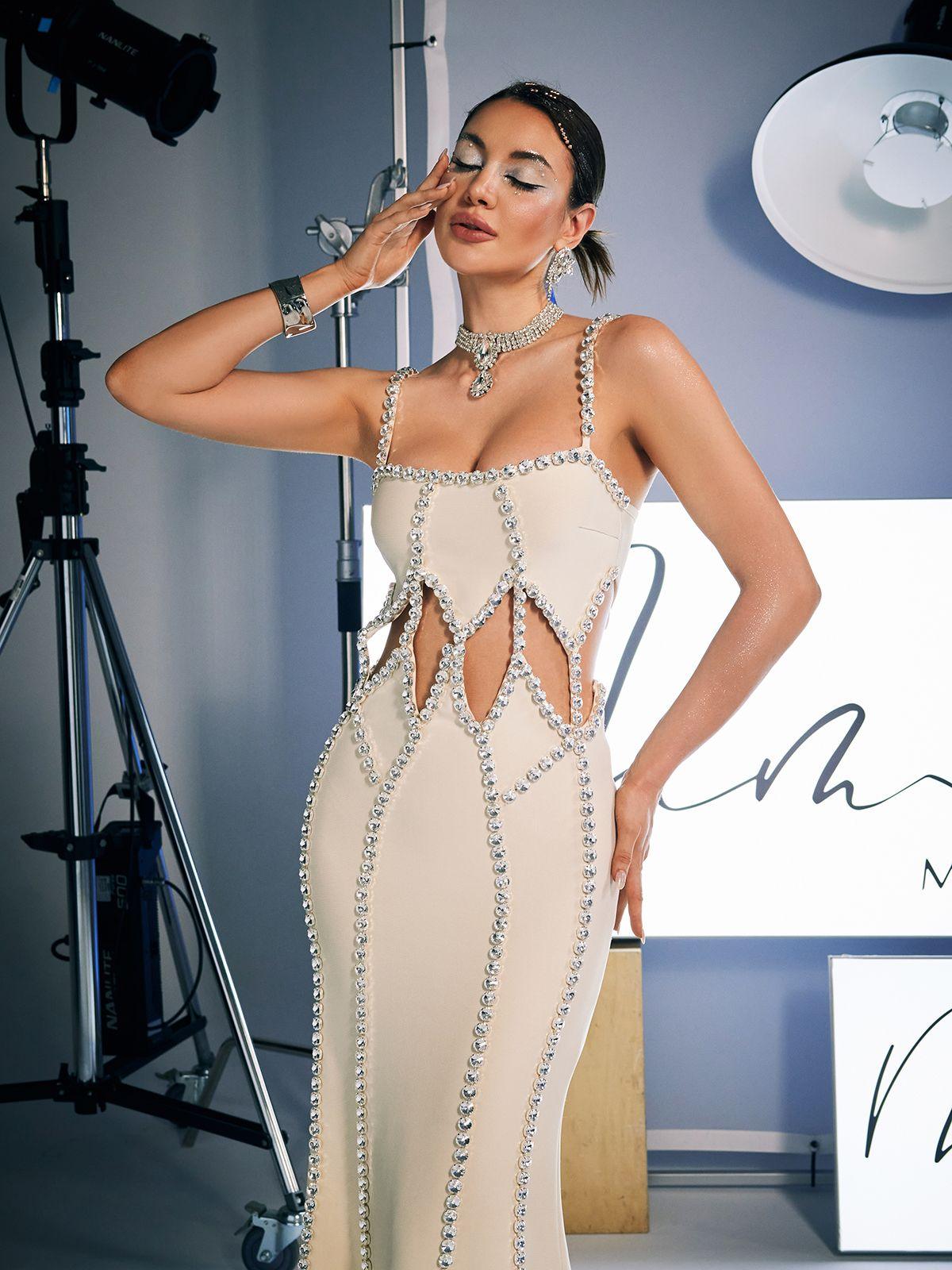Elegant view of the Dario Spaghetti Bandage Dress highlighting its stunning cutout design and crystal accents.