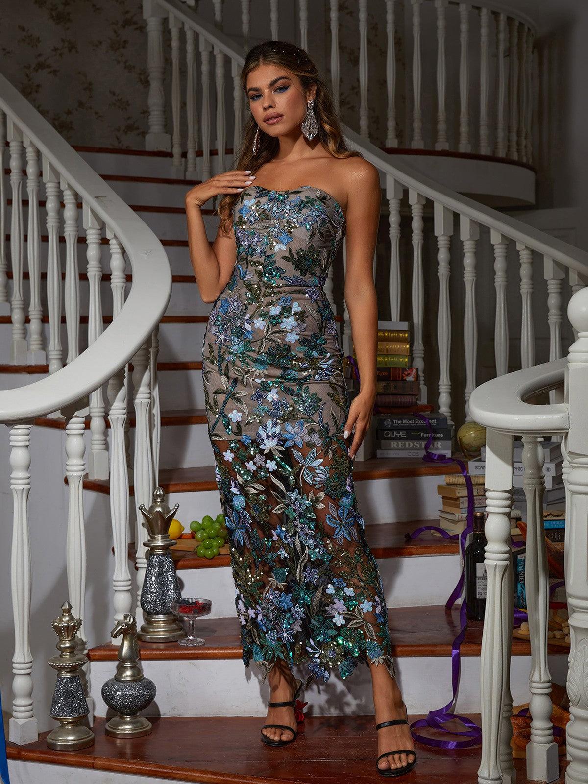 Back view of the Debra Flower Embroidered Sequin Midi Dress highlighting elegant back zip closure.