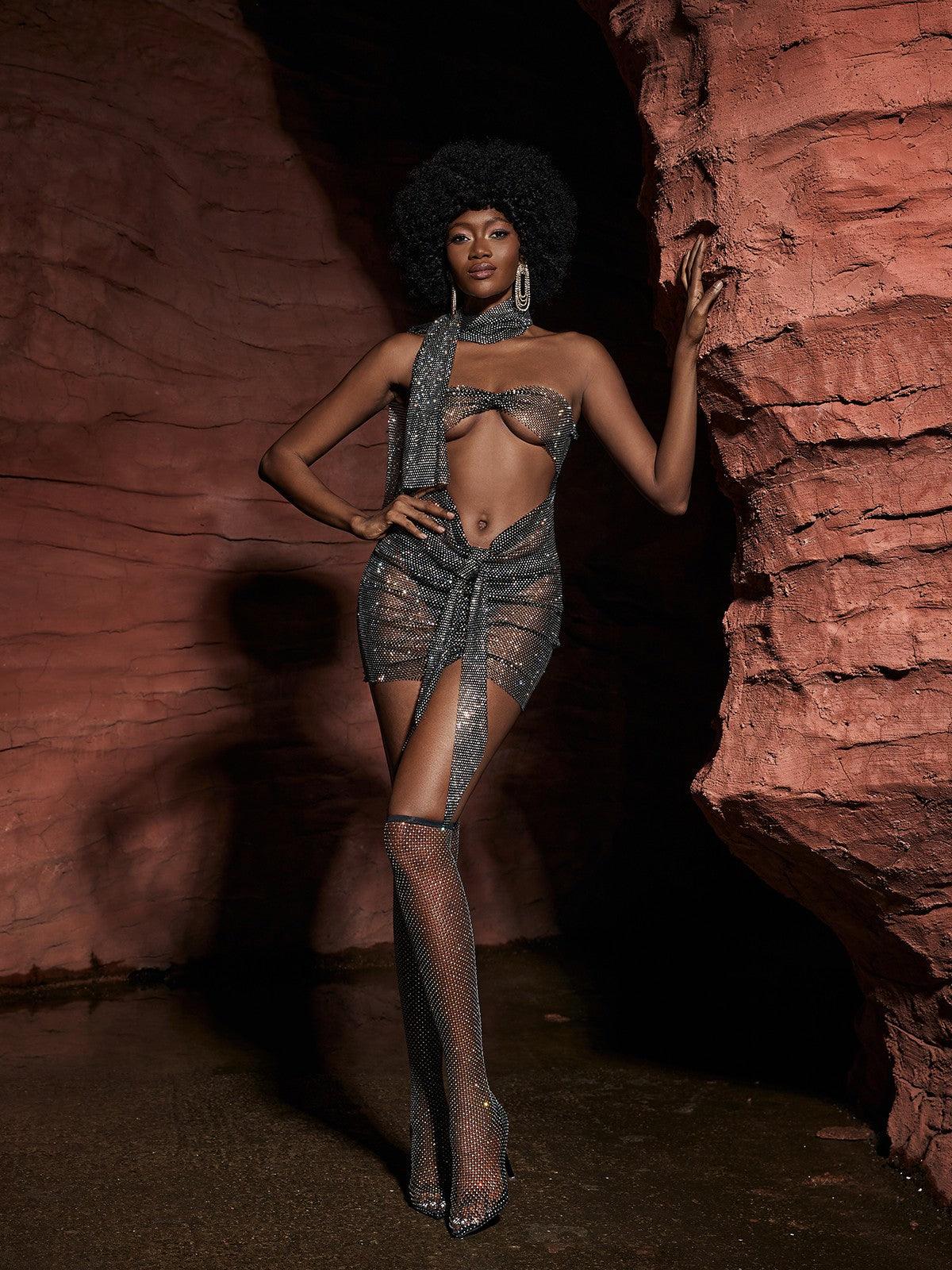 Elegant view of the Delfina Cutout Chainmail Mini Dress highlighting its unique silhouette and party-ready style.