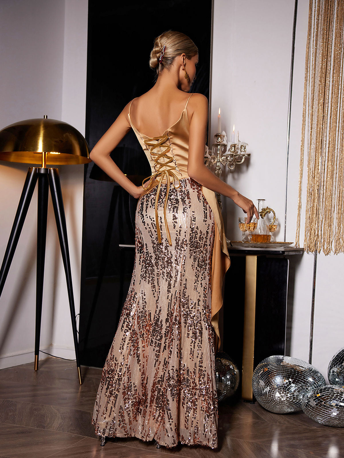 Delores Sequin Maxi Dress in gold, featuring a glamorous design, perfect for evening events and parties.