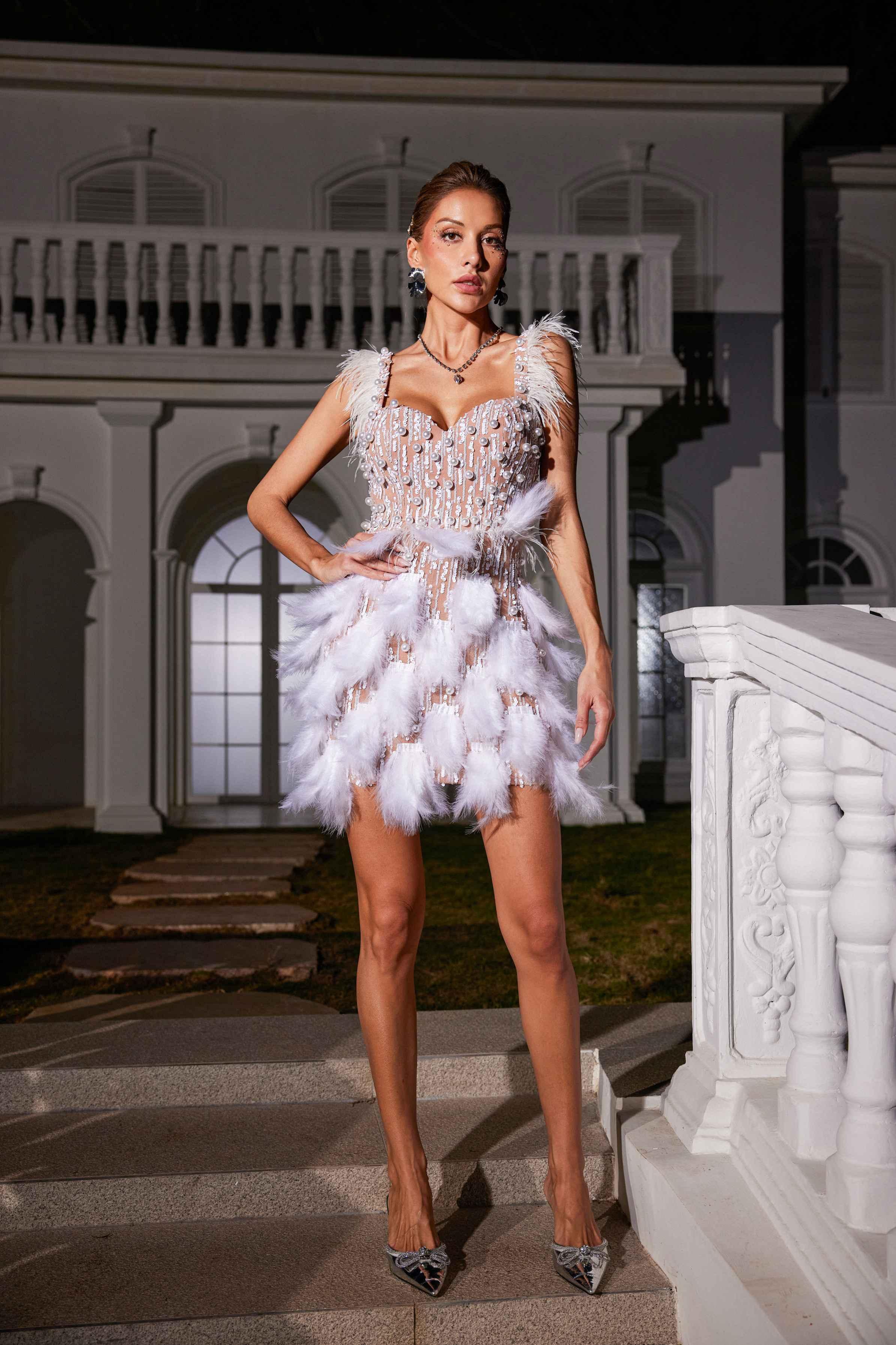 Derby Pearl Feather Sequin Dress in White, adorned with pearls and sequins for an elegant look at special occasions.