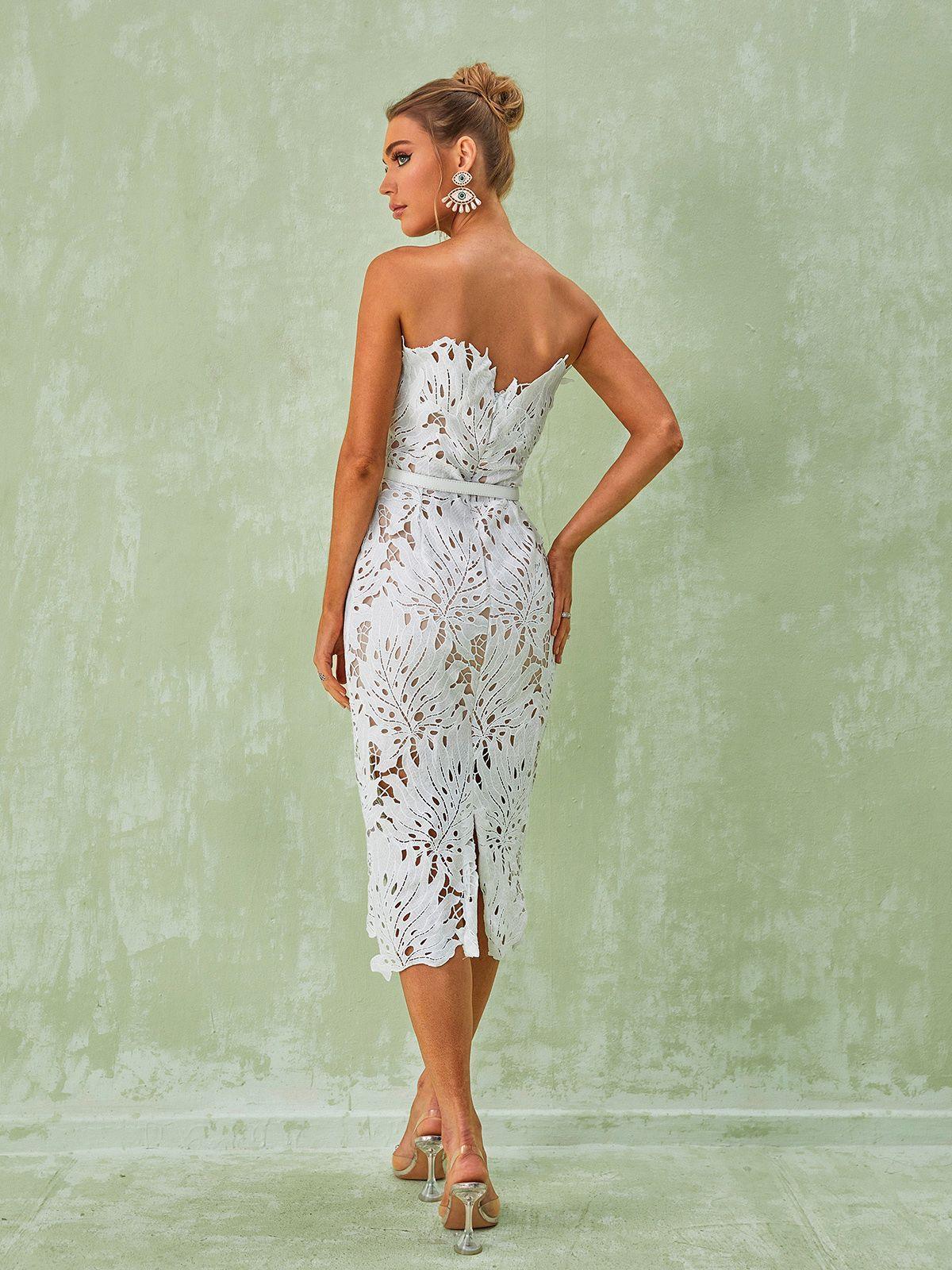 Despina White Lace Midi Dress showcasing intricate lace details and a sophisticated design, ideal for special occasions.