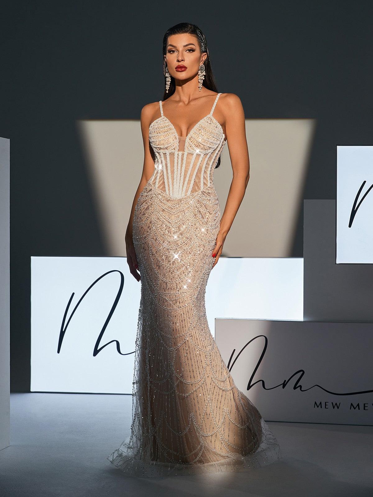 Dion Spaghetti Pearl Embellished Sequin Dress featuring pearl straps and elegant sequin detailing for a glamorous evening look.