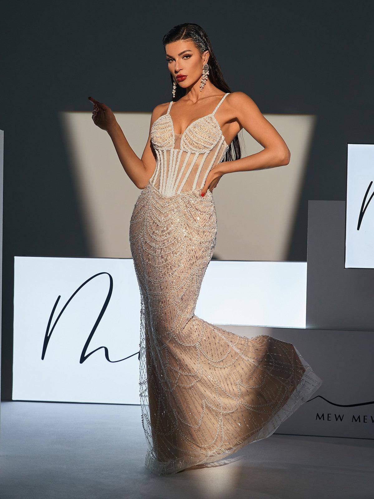 Dion Spaghetti Pearl Embellished Sequin Dress featuring pearl straps and elegant sequin detailing for a glamorous evening look.