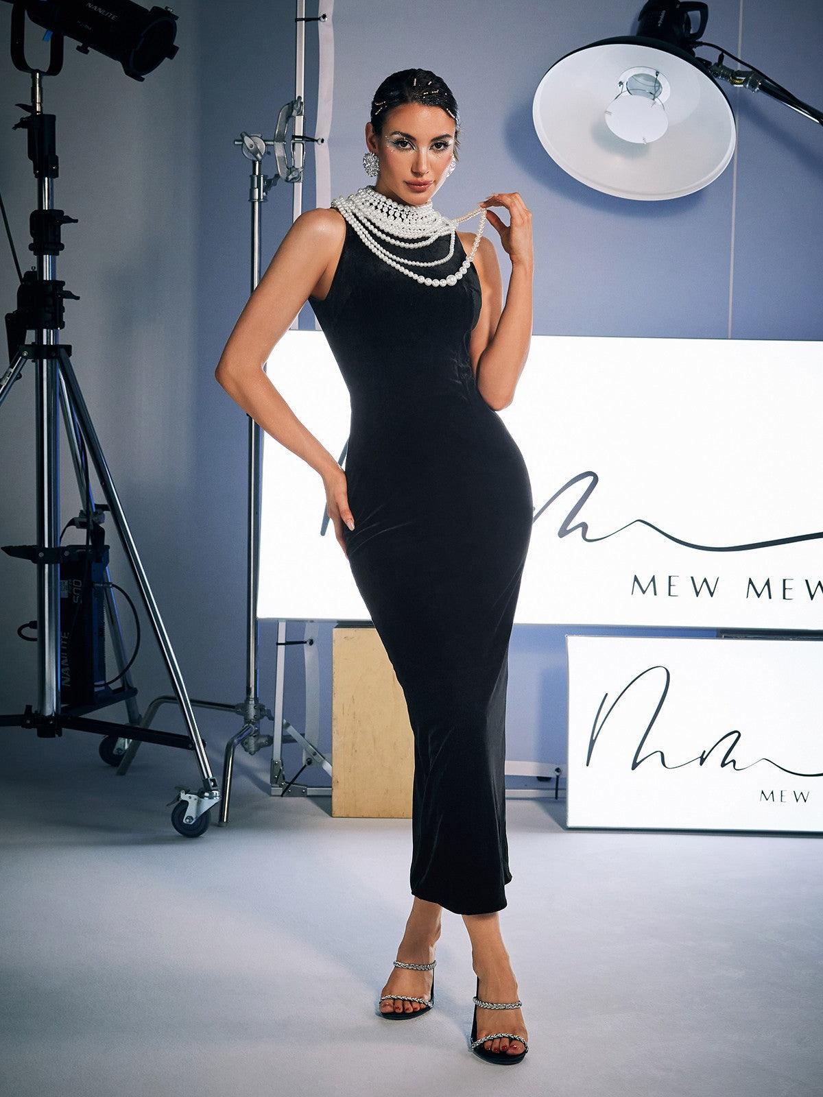 Dustin High Neck Pearl Embellished Maxi Dress showcasing its elegant design and luxurious details, perfect for special occasions.