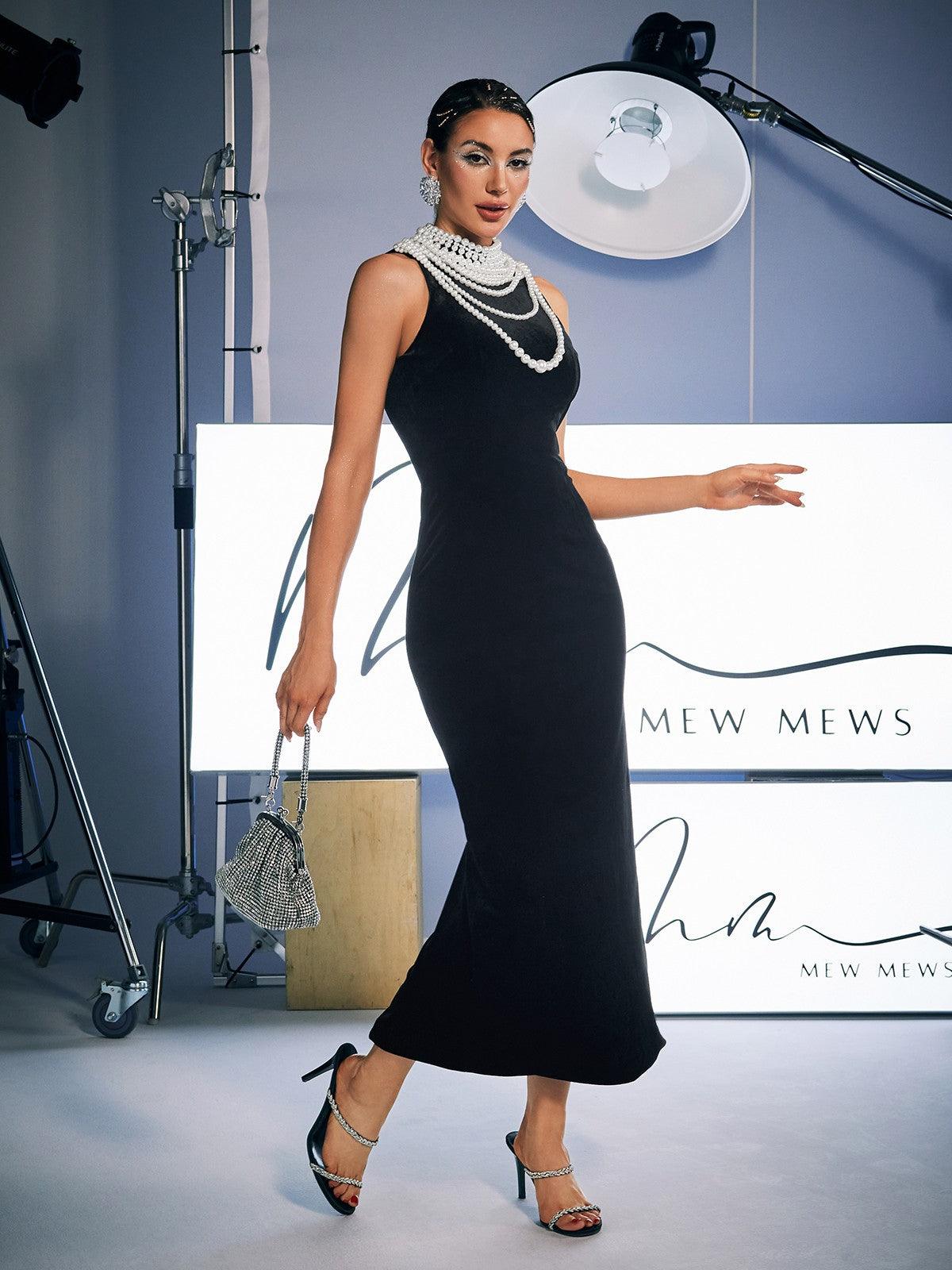 Dustin High Neck Pearl Embellished Maxi Dress showcasing its elegant design and luxurious details, perfect for special occasions.