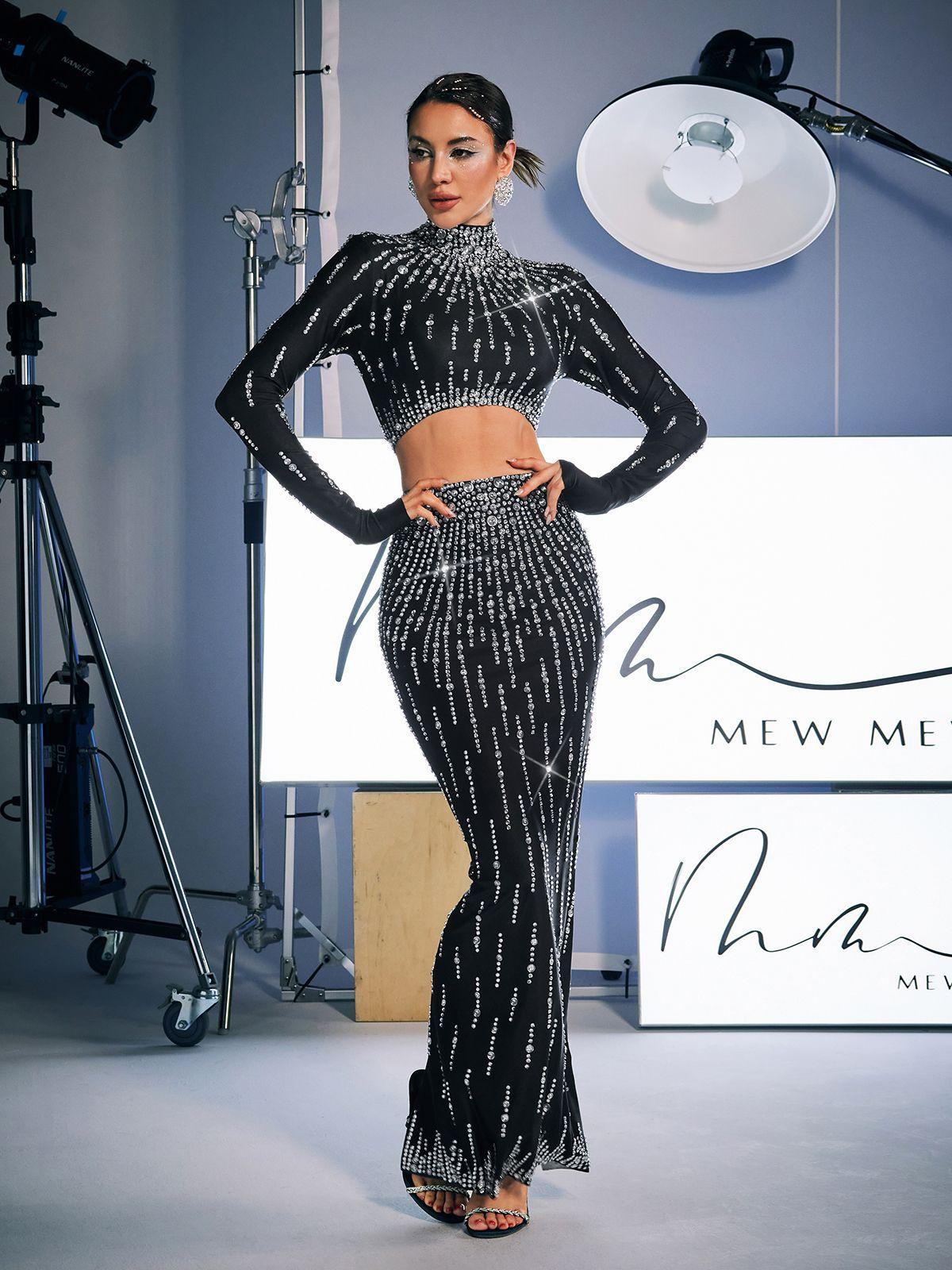 Dutton High Waist Rhinestone Skirt Set showcasing chic black design with stunning embellishments for elegant evenings.