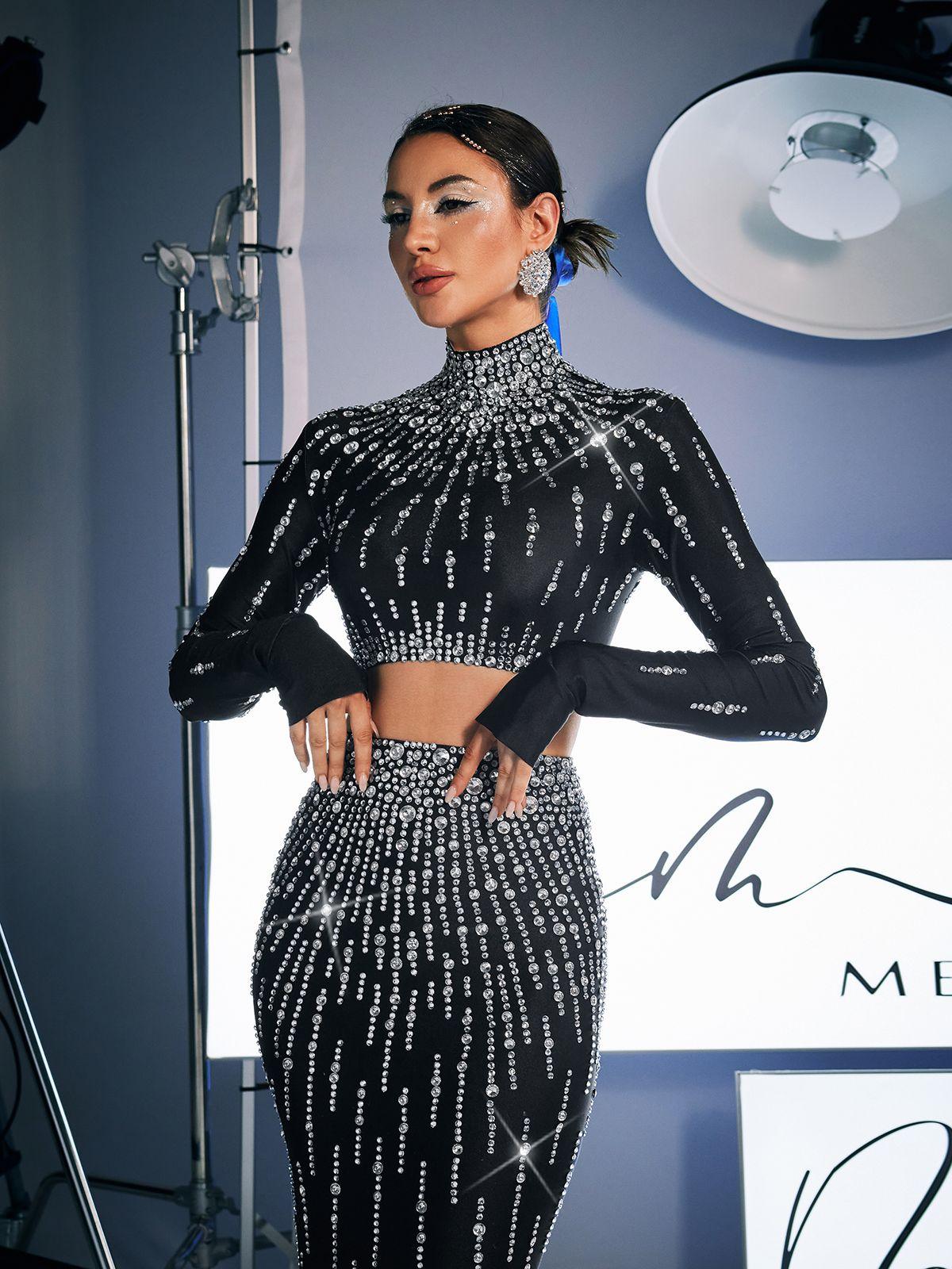 Dutton High Waist Rhinestone Skirt Set showcasing chic black design with stunning embellishments for elegant evenings.