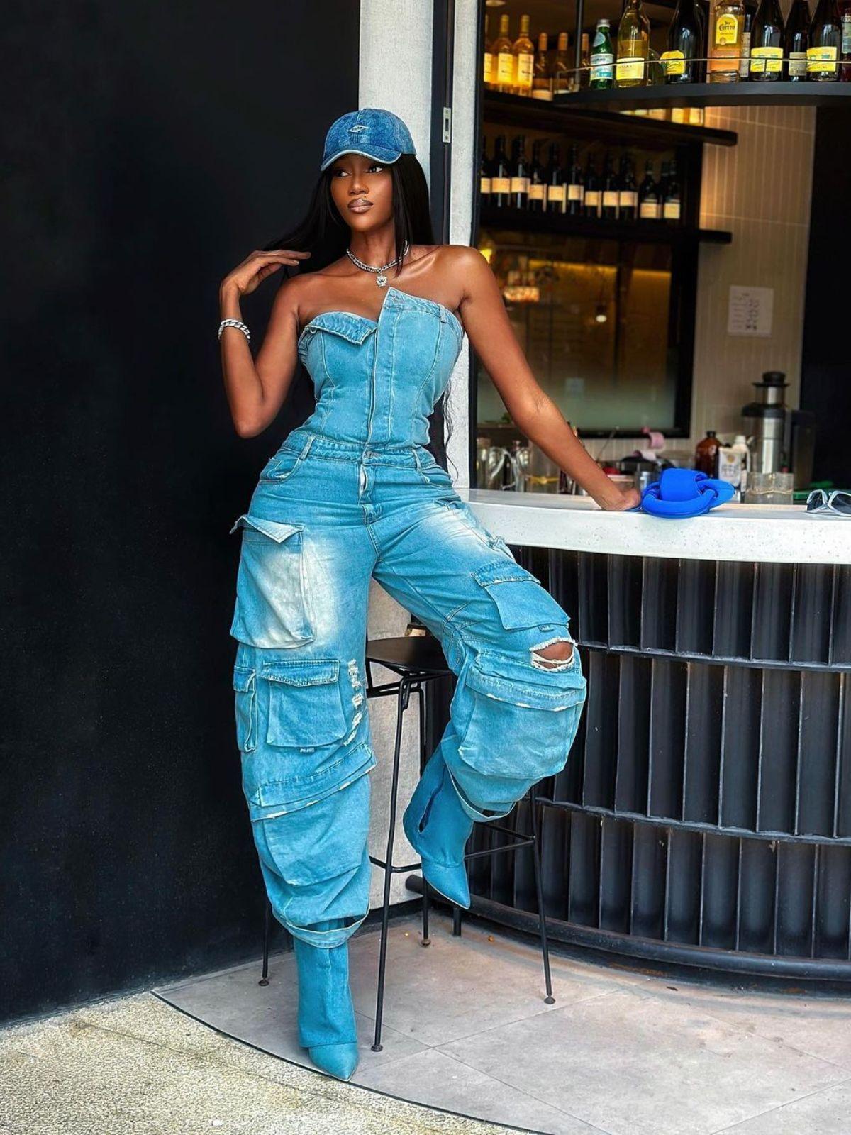 Eden Strapless Pocket Denim Jumpsuit in Blue, showcasing a chic bandeau silhouette and pocket details.