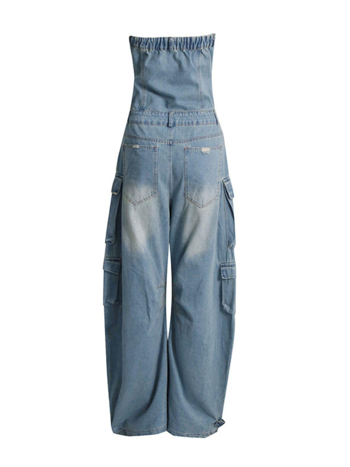 Close-up of the pocket detailing on the Eden Strapless Denim Jumpsuit in Blue.