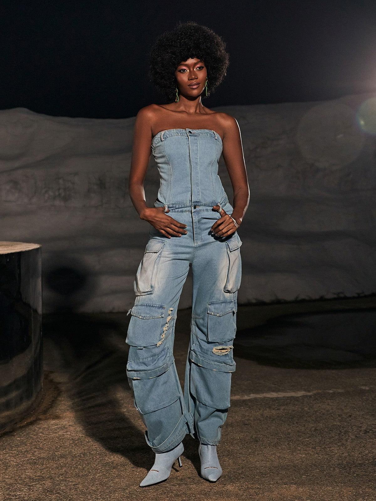 Eden Strapless Pocket Denim Jumpsuit in Blue, showcasing a chic bandeau silhouette and pocket details.
