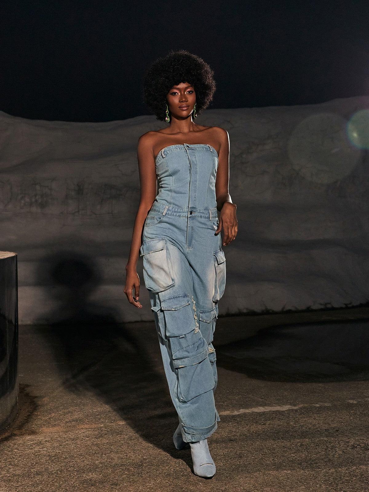Back view of the Eden Strapless Pocket Denim Jumpsuit showcasing its slim fit.