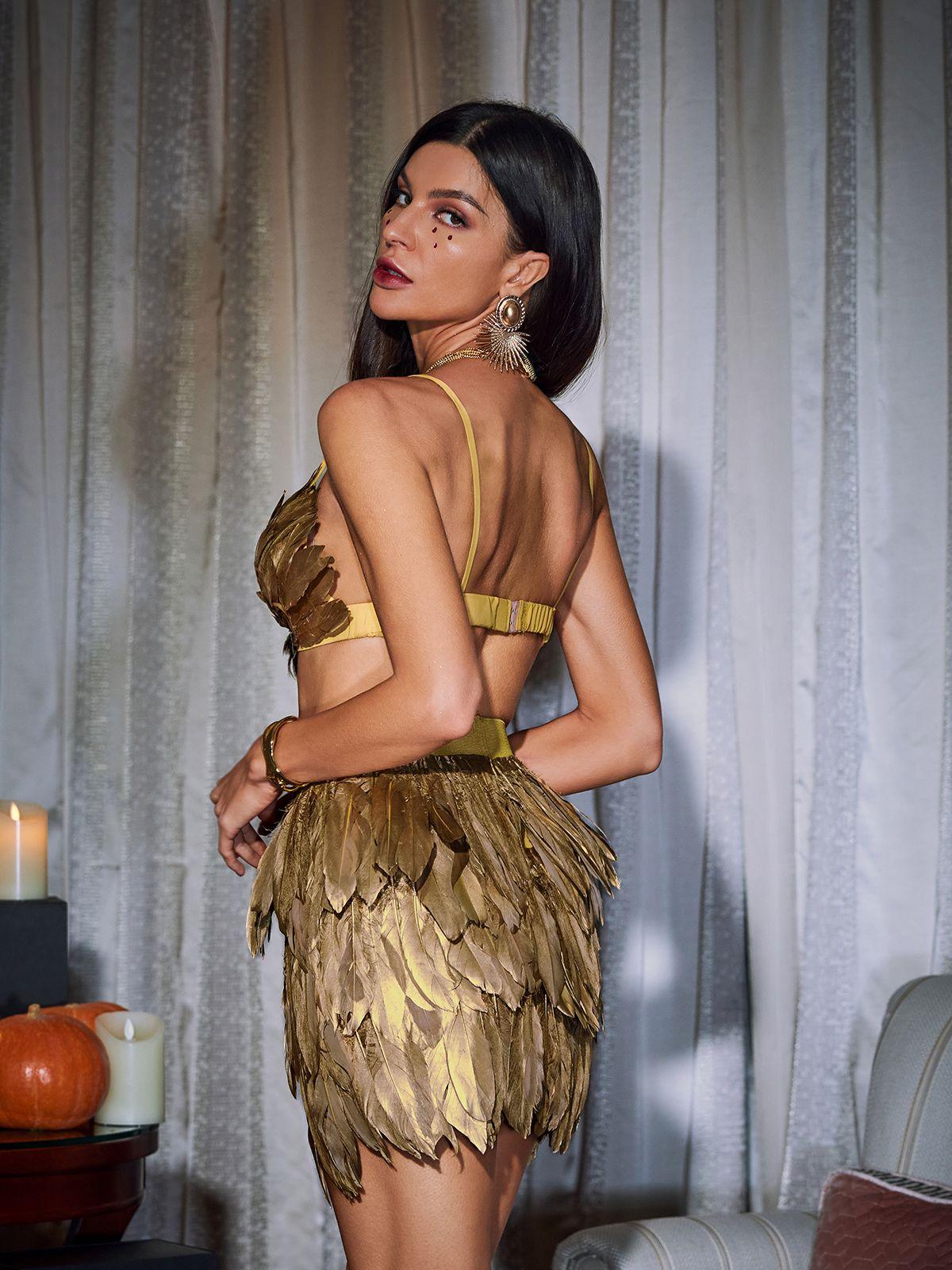 Eir Feather Trimmed Skirt Set showcasing elegant design with feather trim in gold, perfect for a chic style.
