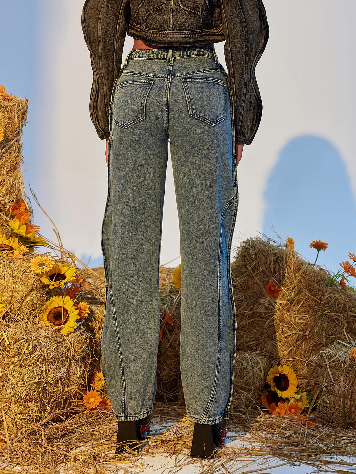 Eleanore Wave Denim Pants in classic blue with a stylish wave design and flattering fit for women.