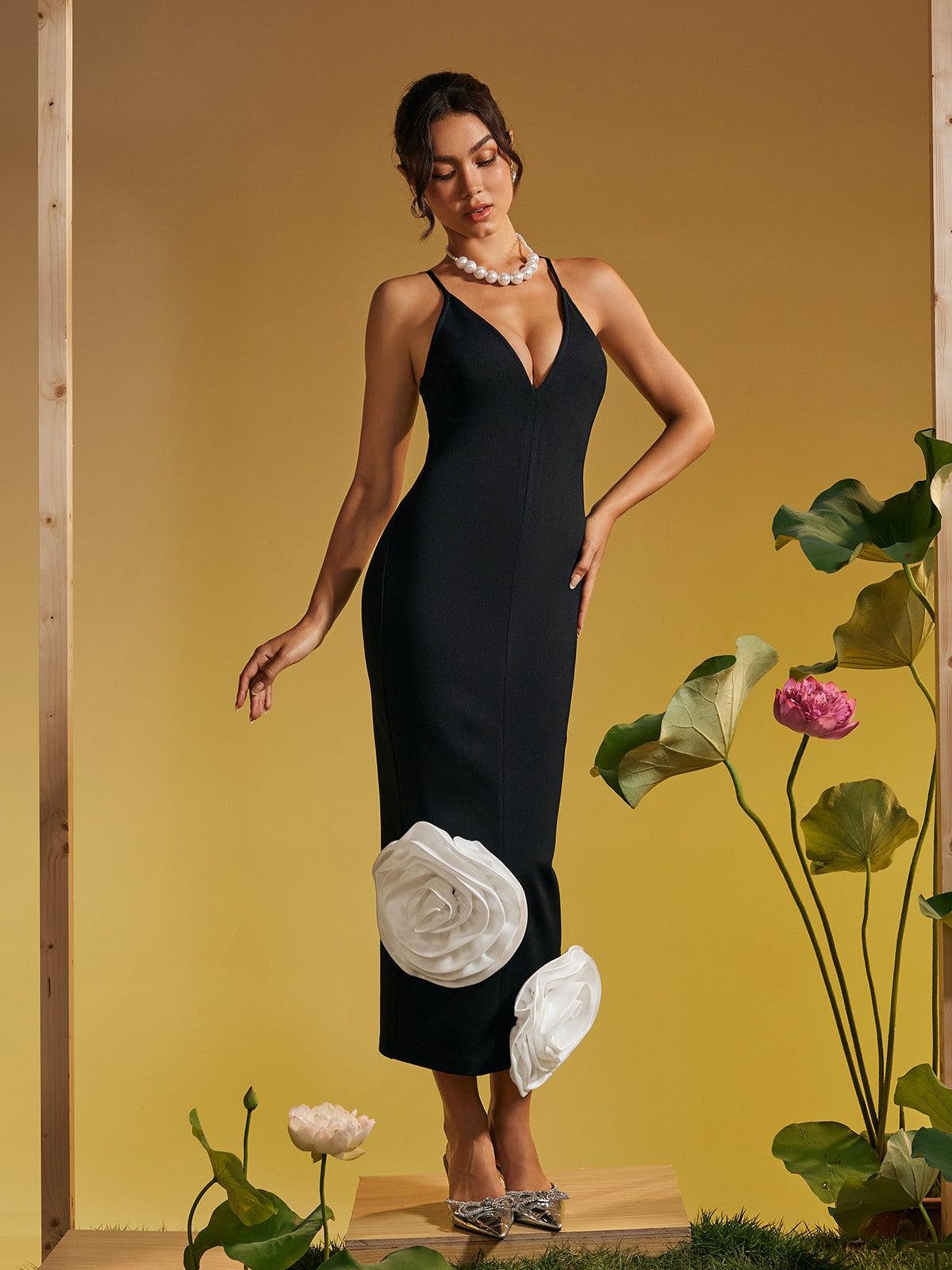 Close-up of the flower pattern on the Elihu Spaghetti Bandage Midi Dress, highlighting its elegant design.
