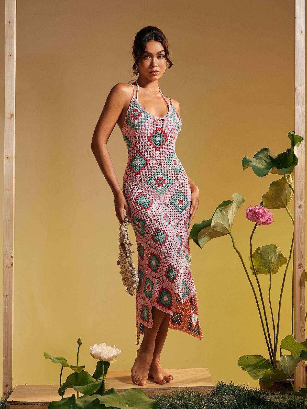 Eliora Open Back Hollow Knitted Midi Dress in pink with elegant design and hollow details, perfect for stylish vacations.