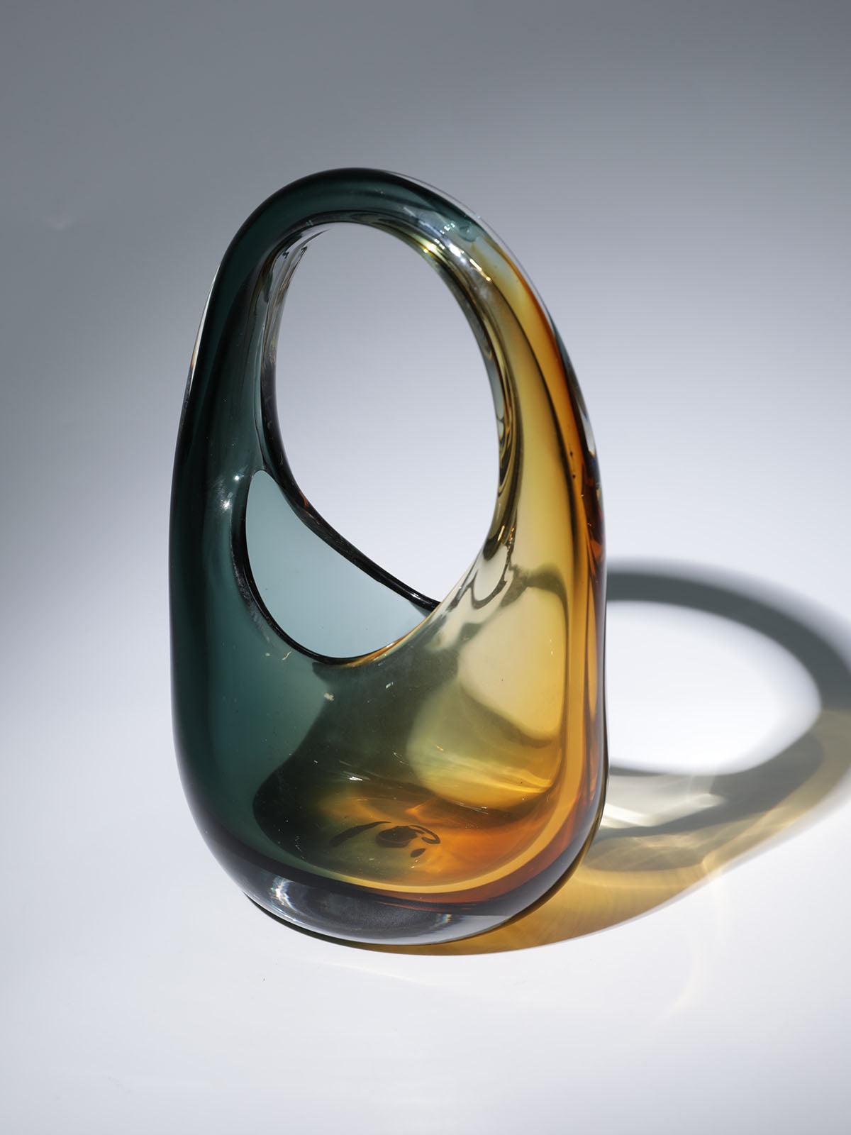 Elvira Amber Ombre Glass Bag showcasing its luxurious design and elegant color gradient.