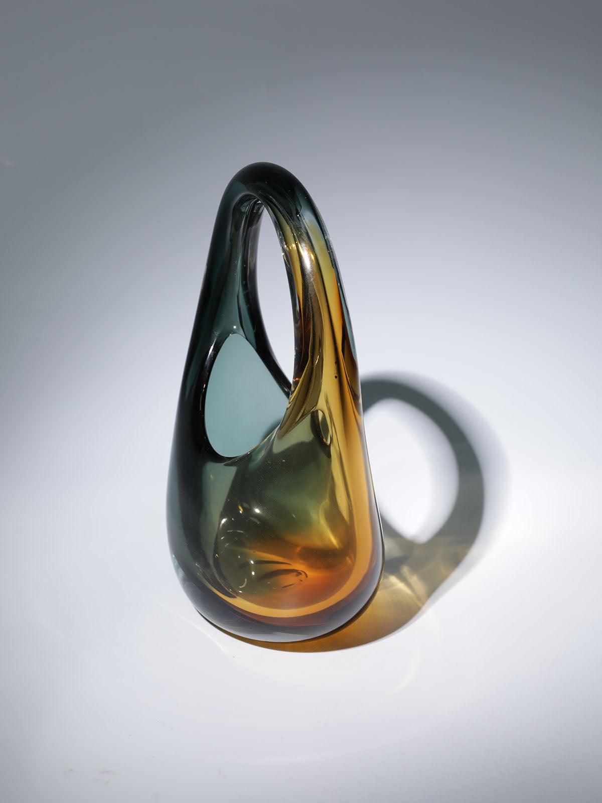 Detailed view of the Elvira Glass Bag's luxurious craftsmanship and finish.