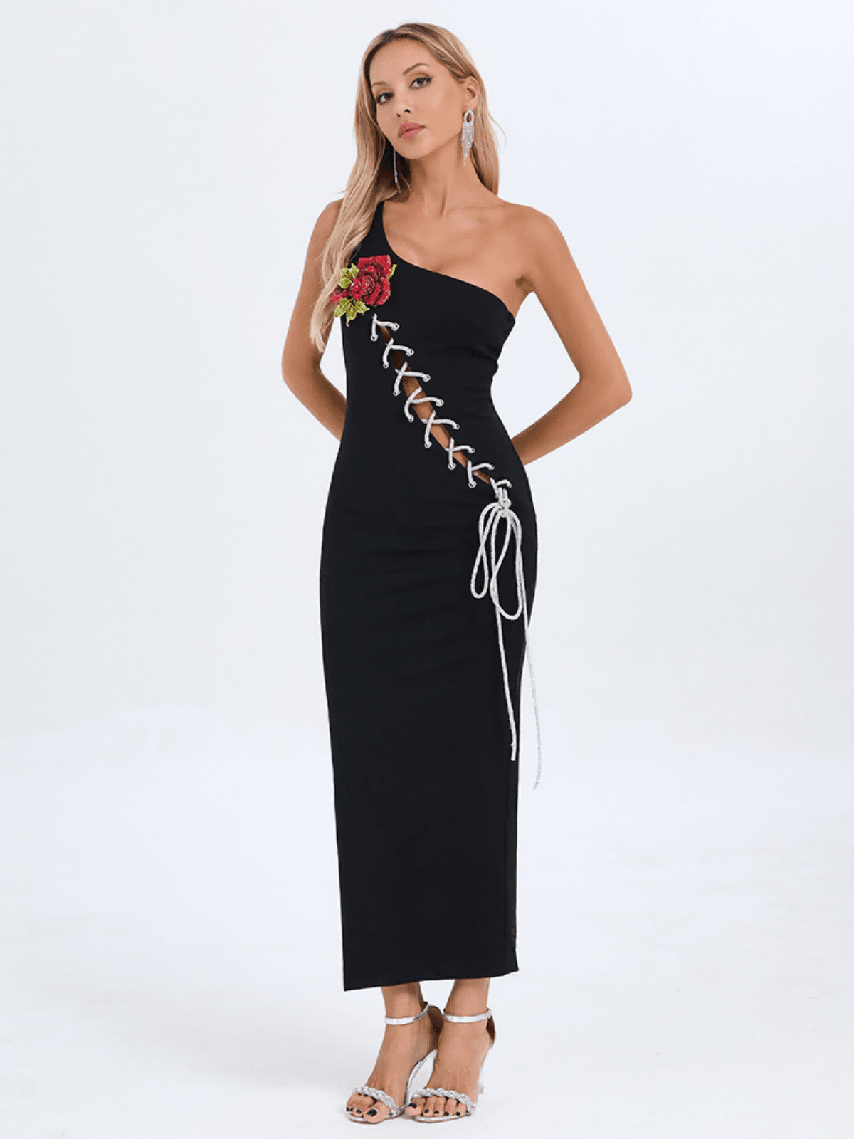 Side view of the Engel Lace Up Flower Midi Dress highlighting the intricate lace-up design and flowing midi length.
