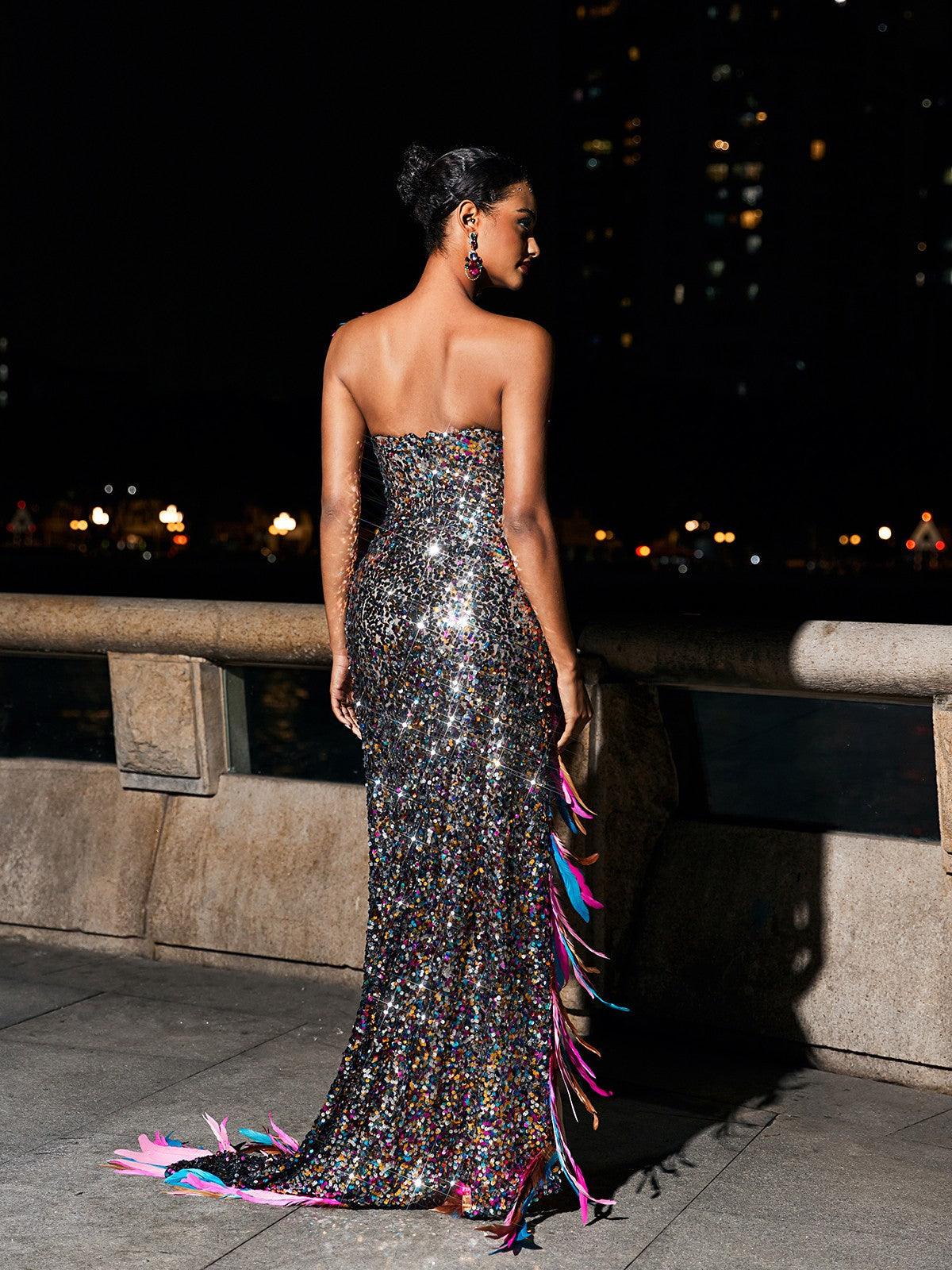 Elegant Ernest Strapless Feather Split Sequin Dress featuring shimmering sequins and a dramatic split, perfect for any special occasion.