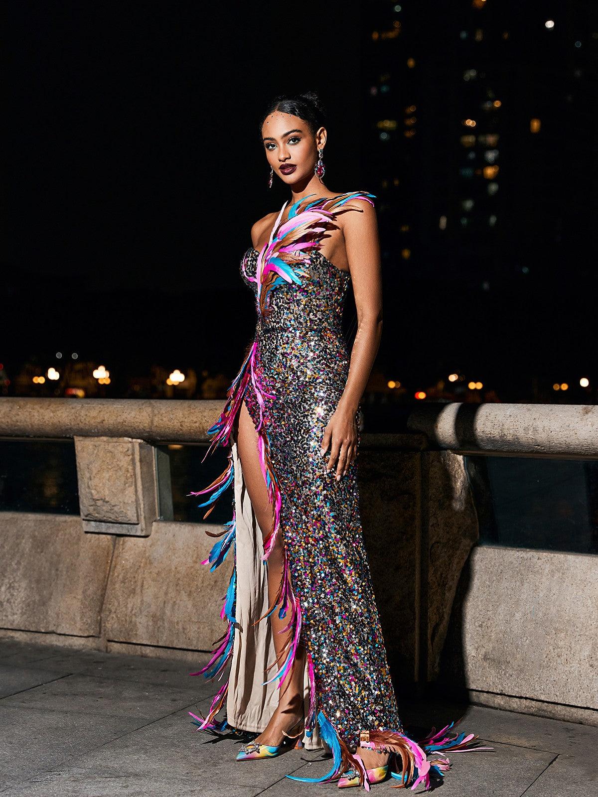 Elegant Ernest Strapless Feather Split Sequin Dress featuring shimmering sequins and a dramatic split, perfect for any special occasion.