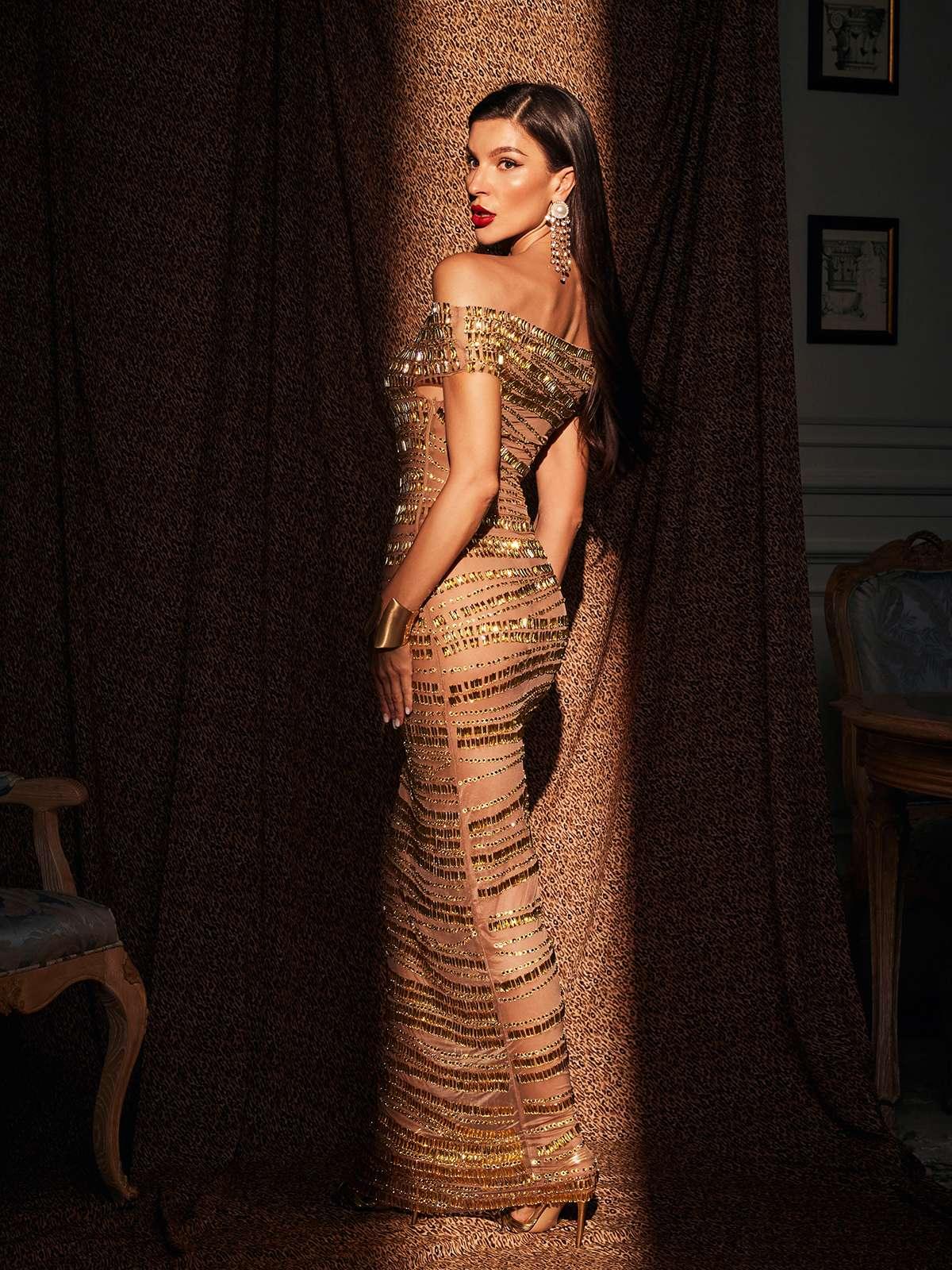 Eryx Off Shoulder Rhinestone Mesh Maxi Dress showcasing elegance and glamour for evening events.