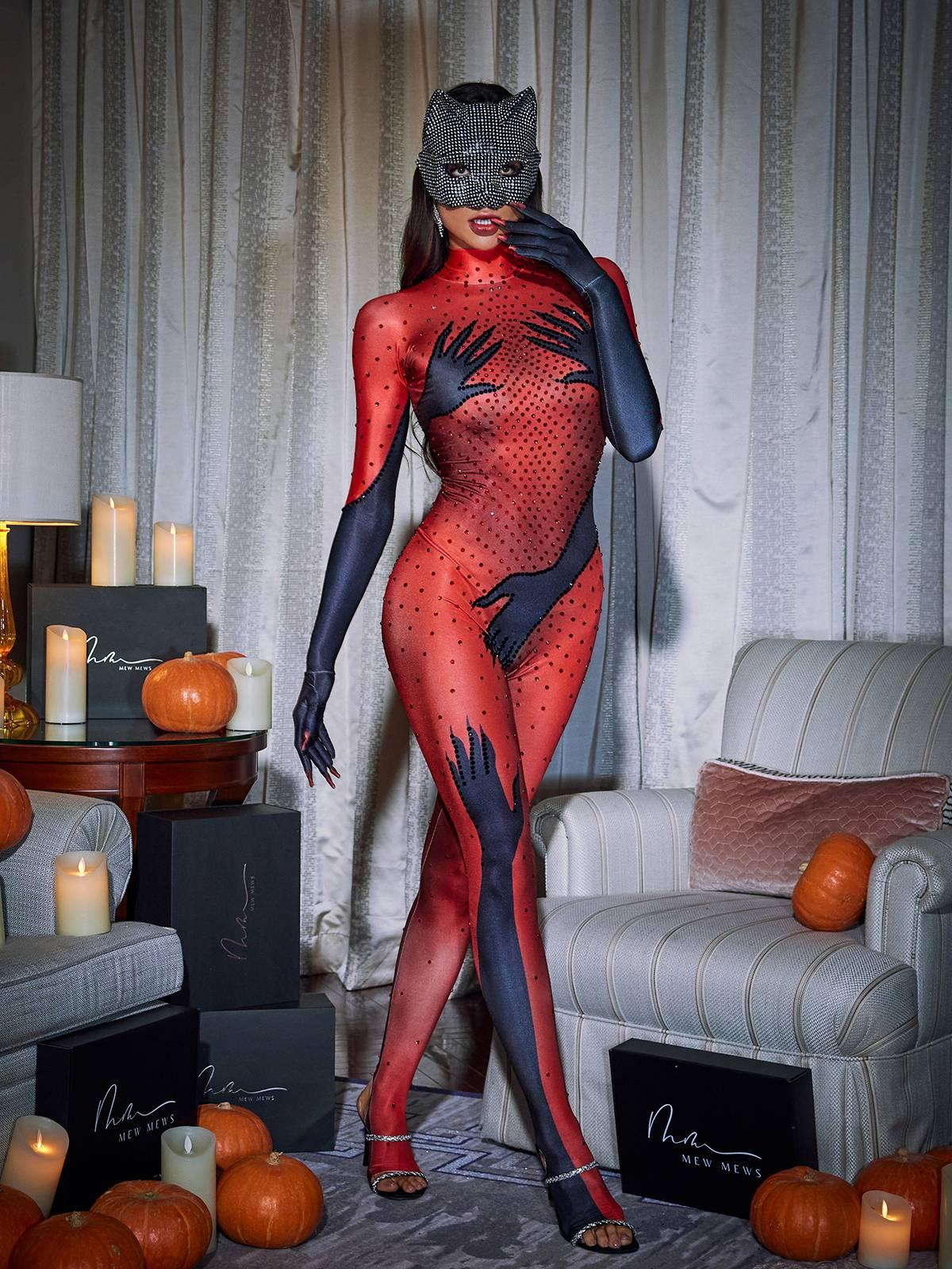 Full view of a model wearing the Esau Hands Printed Jumpsuit, perfect for festival and evening wear.