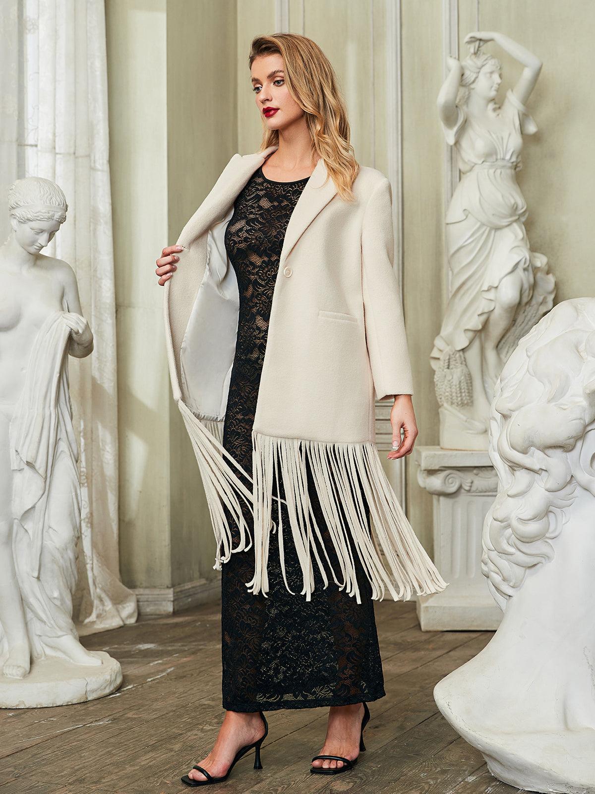 Close-up view of the fringe detailing on the Esclarmonde V Neck Woolen Coat, highlighting its unique and fashionable elements.