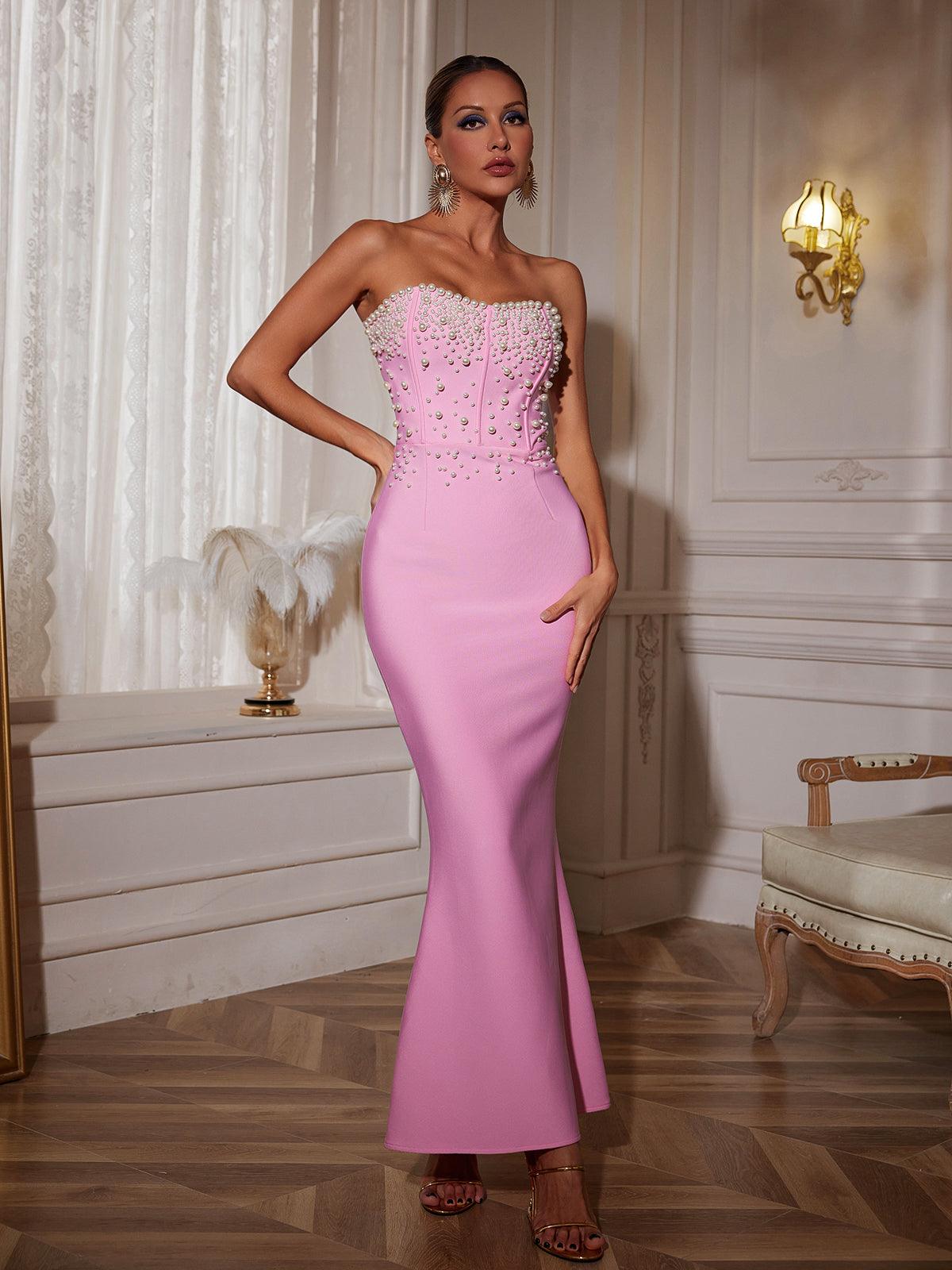 Everett Strapless Pearl Bandage Dress in pink, showcasing luxurious pearl details and a bodycon silhouette.