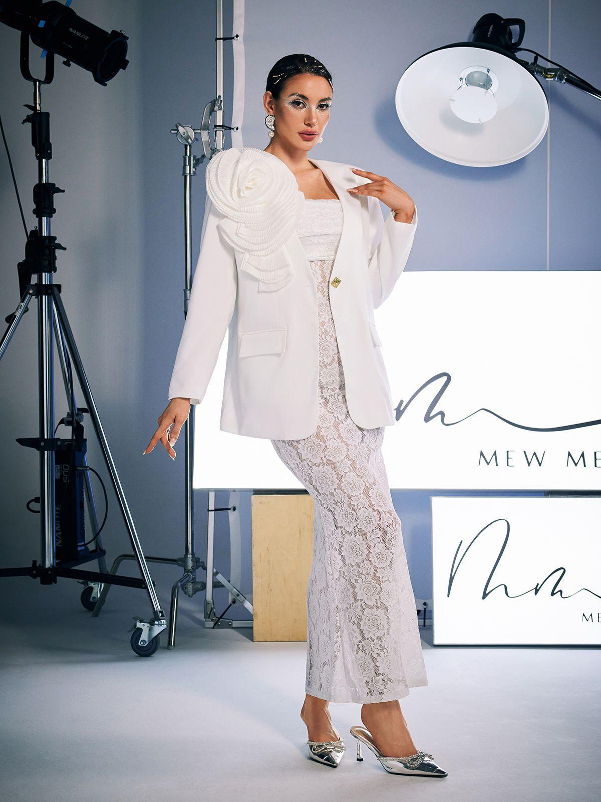 Model wearing the Finnley V Neck Flower Blazer, demonstrating its versatile and confident styling options.