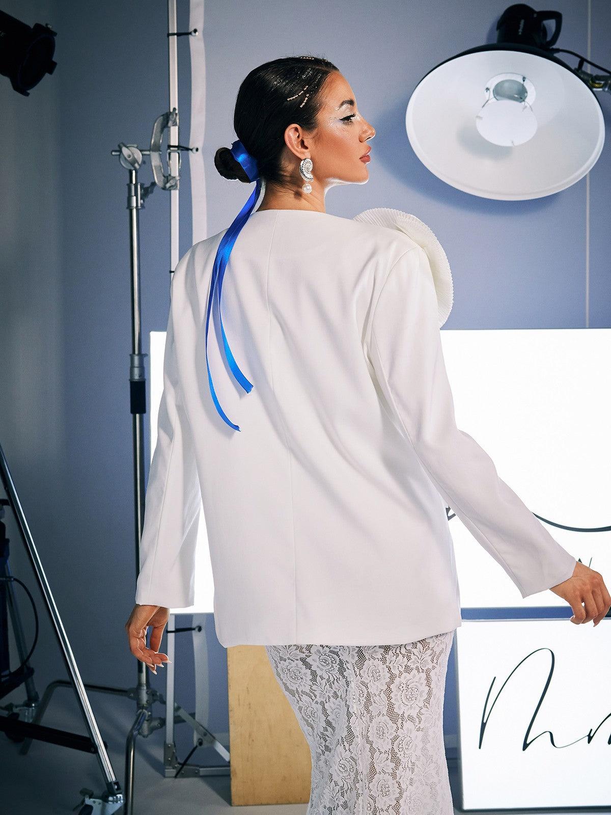 Finnley V Neck Flower Blazer in white with floral patterns for a stylish outerwear option.