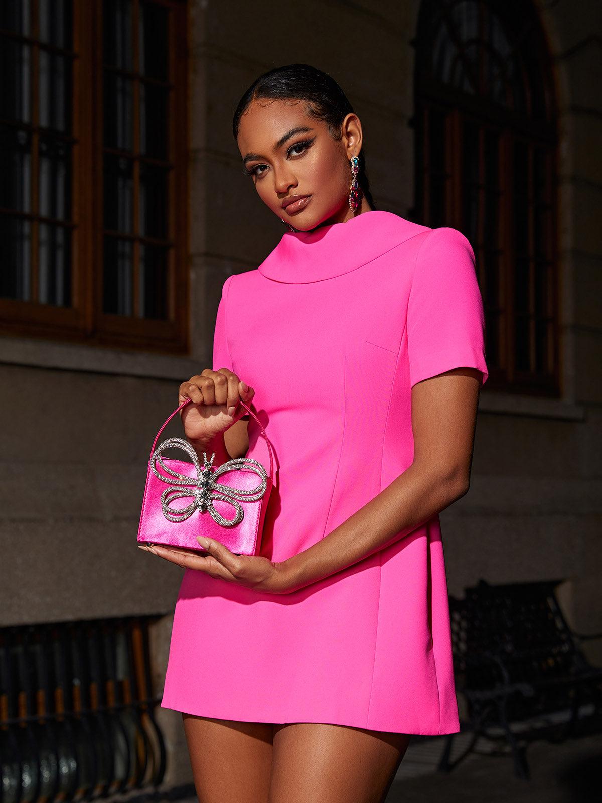 Florrie Short Sleeve Bow Mini Dress in Hot Pink, featuring a stylish bow back design perfect for cocktail events.