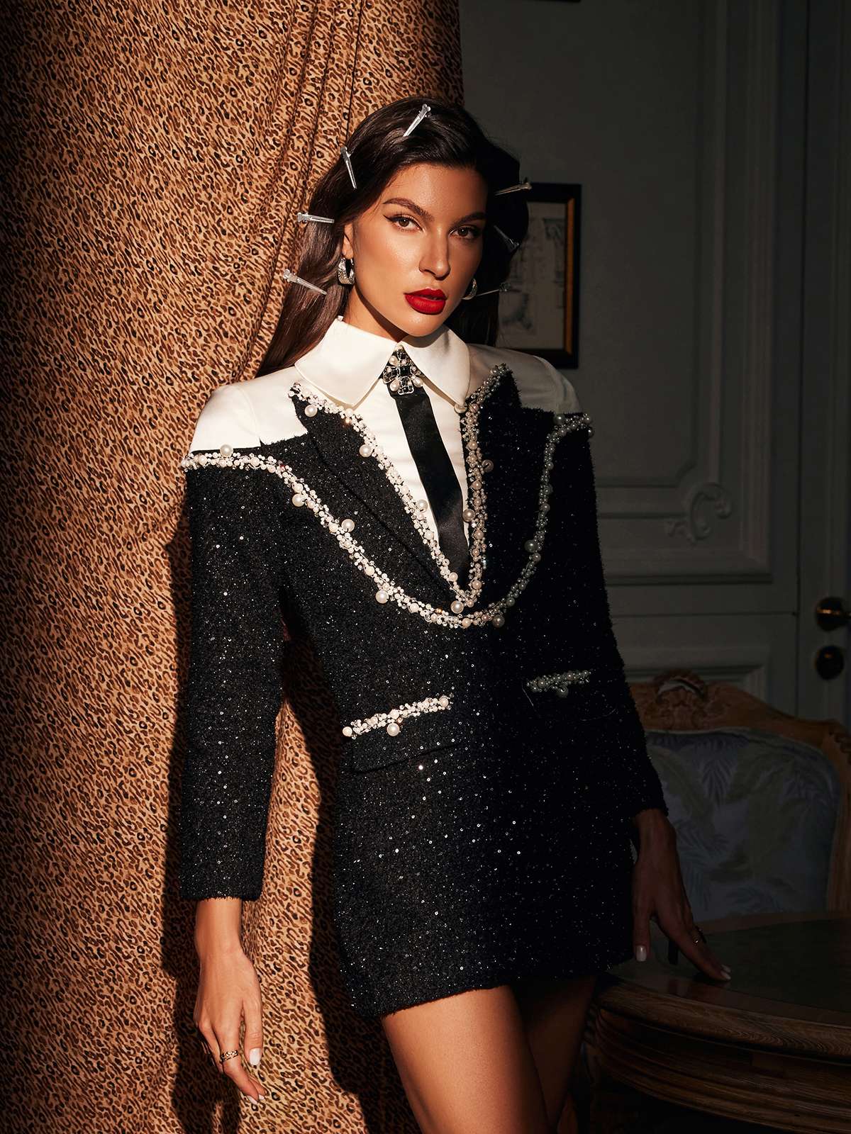 Detail shot of the Galilea Embellished Sequin Collar Dress showcasing its exquisite sequin collar and elegant design.