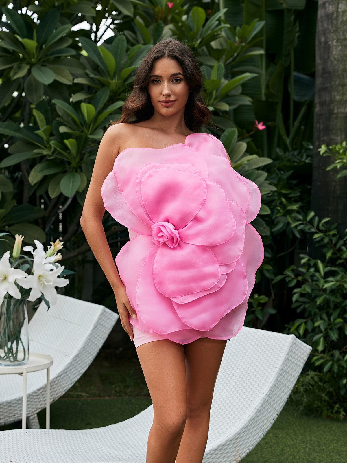 Gannon one shoulder flower mini dress in pink, showcasing floral design and elegant silhouette for special occasions.