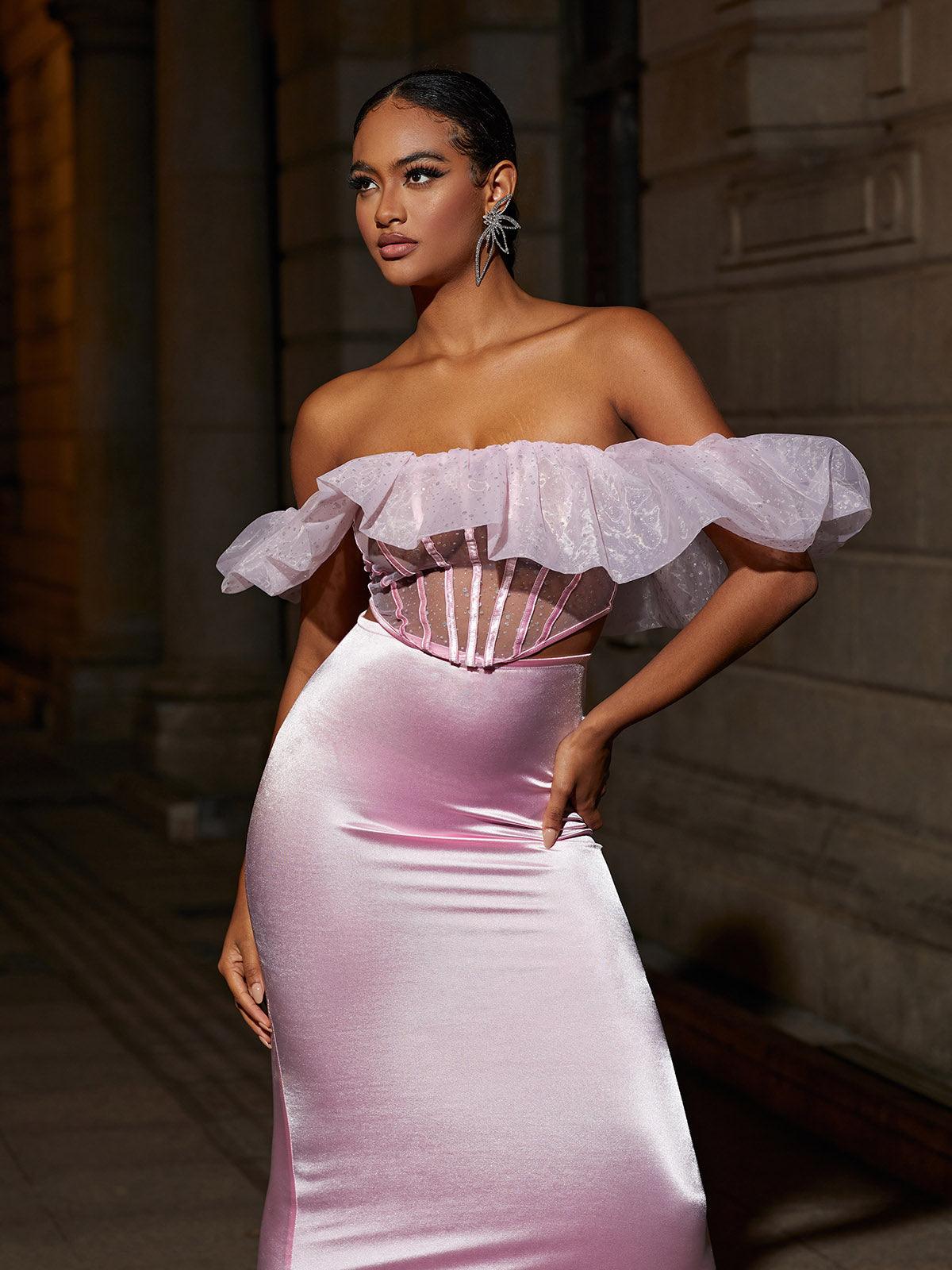Model showcasing the Garnet Off Shoulder Corset Satin Skirt Set, capturing its elegance for evening wear.