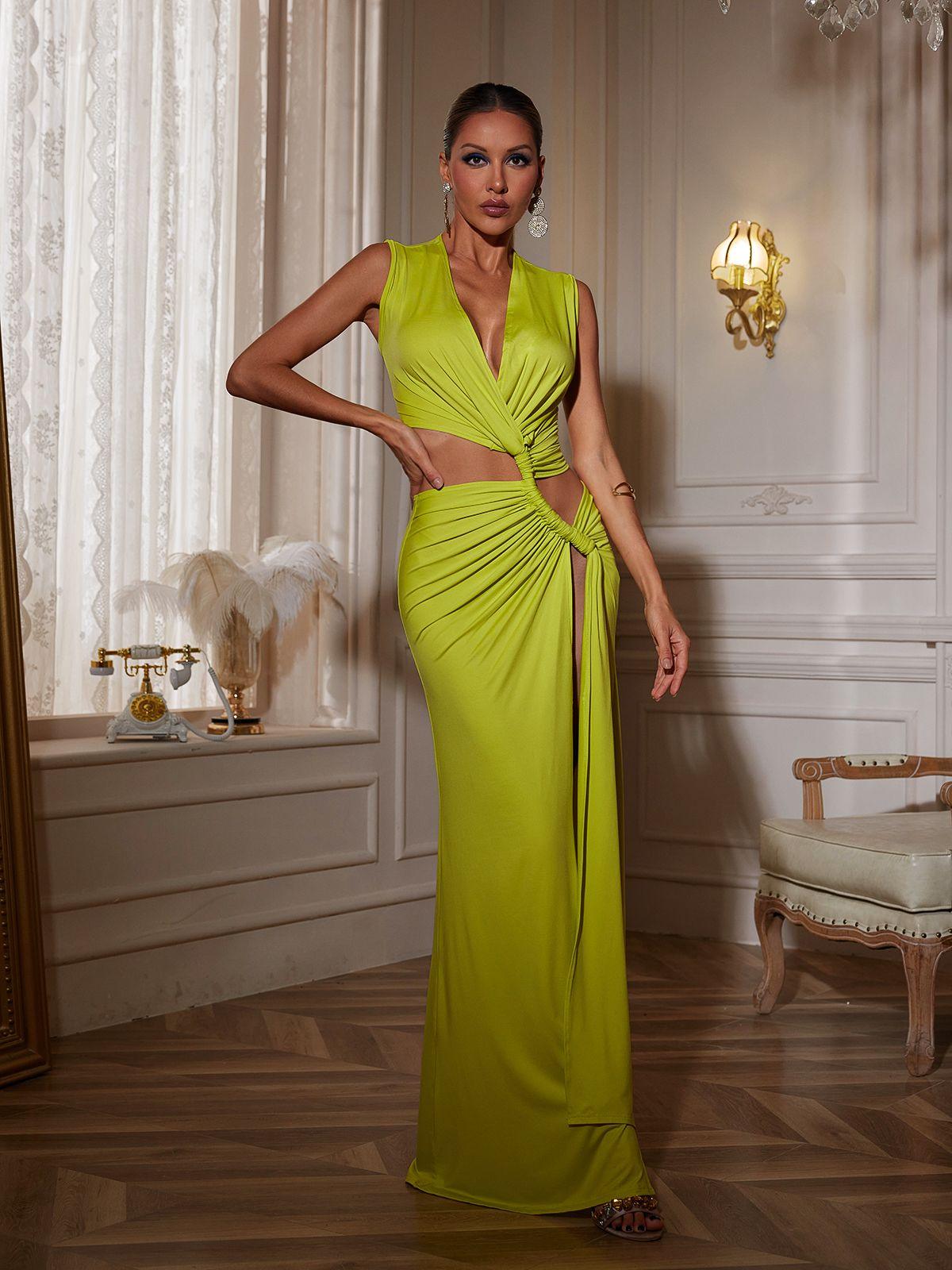 Close-up of the cutout details on the Gertrude V Neck Maxi Dress, emphasizing its edgy style and elegant silhouette.