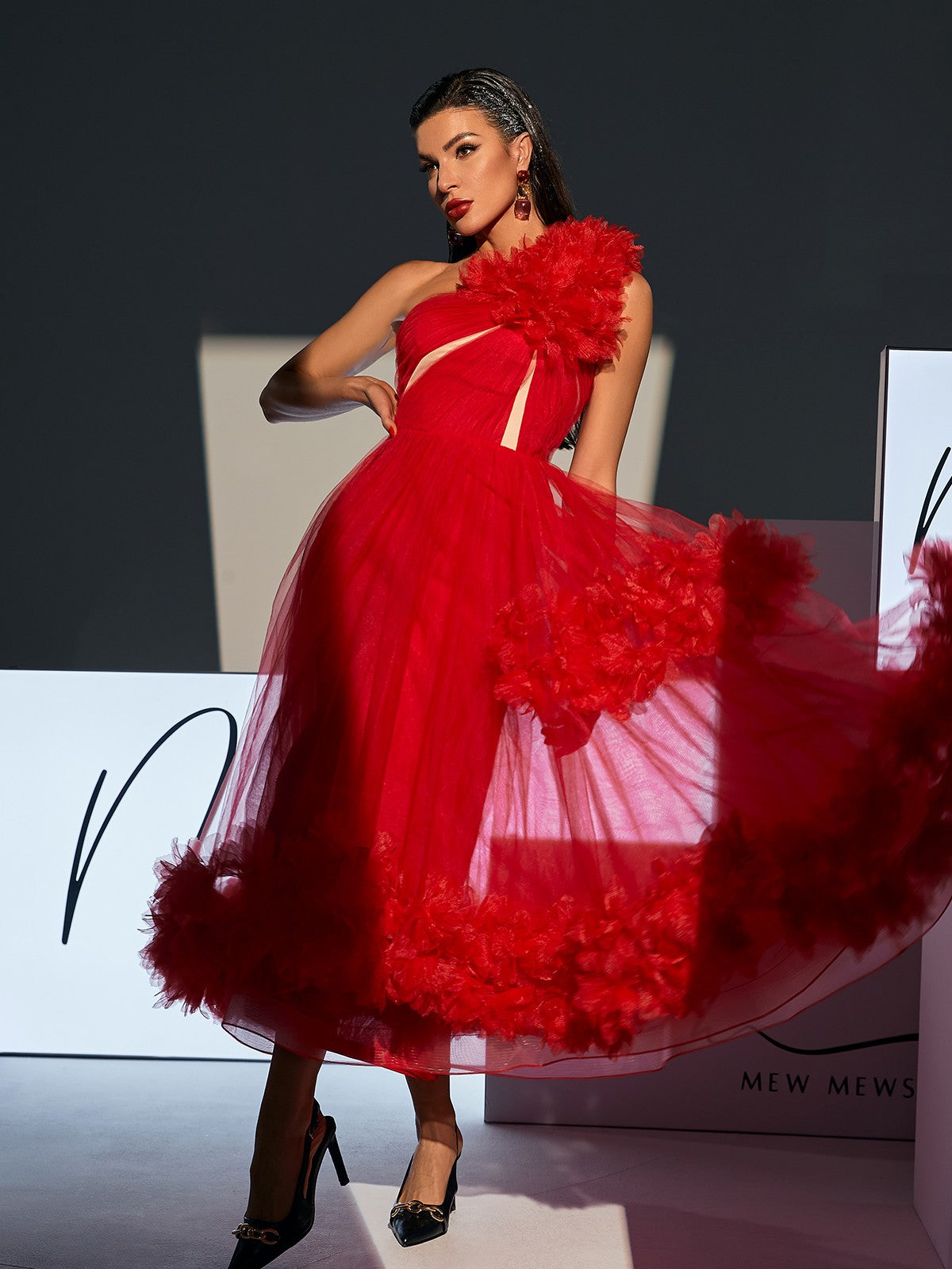 Ghslaine One Shoulder Tulle Midi Dress in Red, showcasing its elegant design and lightweight tulle fabric.