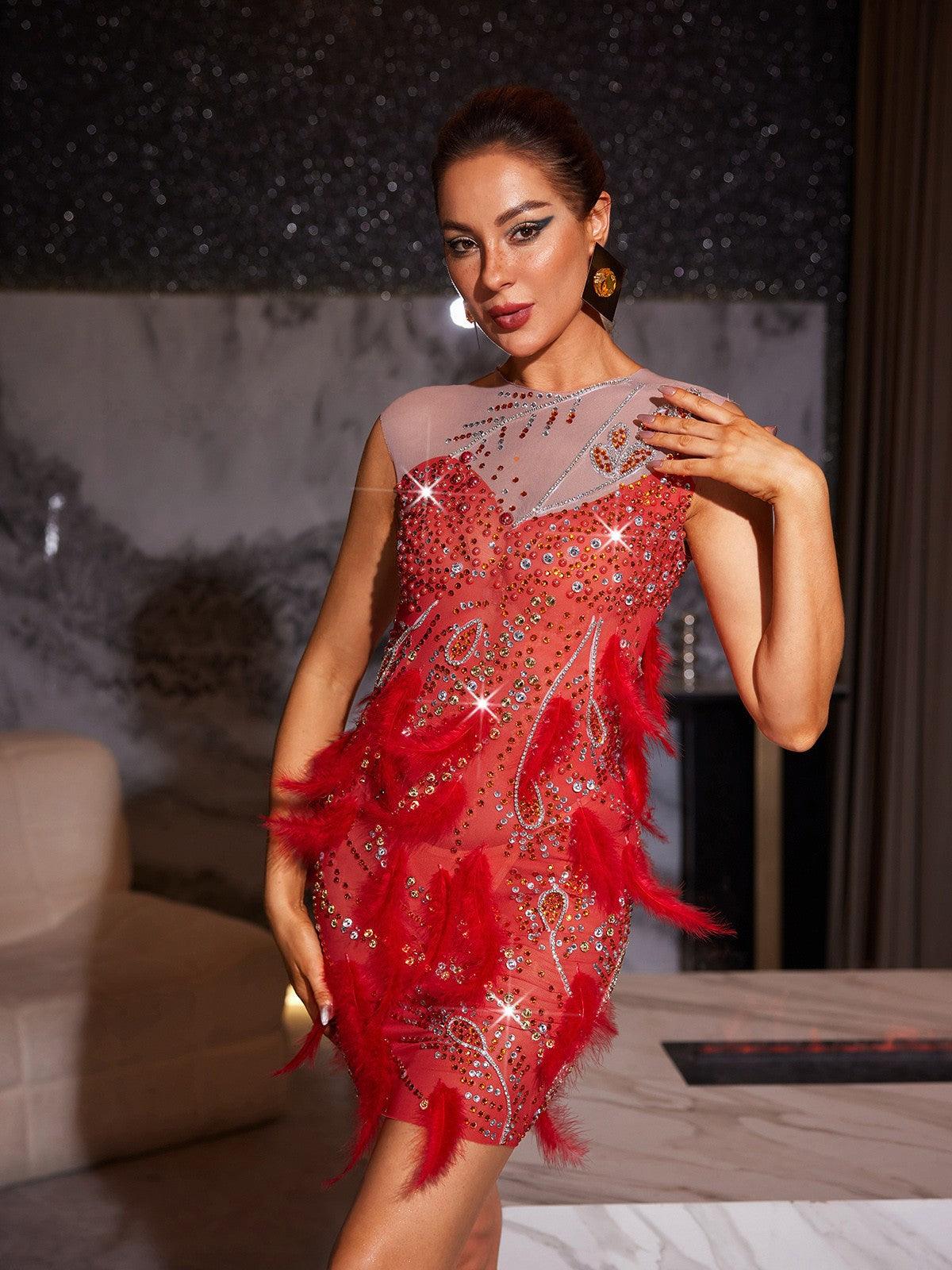Goku Rhinestone Feather Mini Dress featuring elegant feathers and shimmering rhinestones, ideal for chic evening wear.